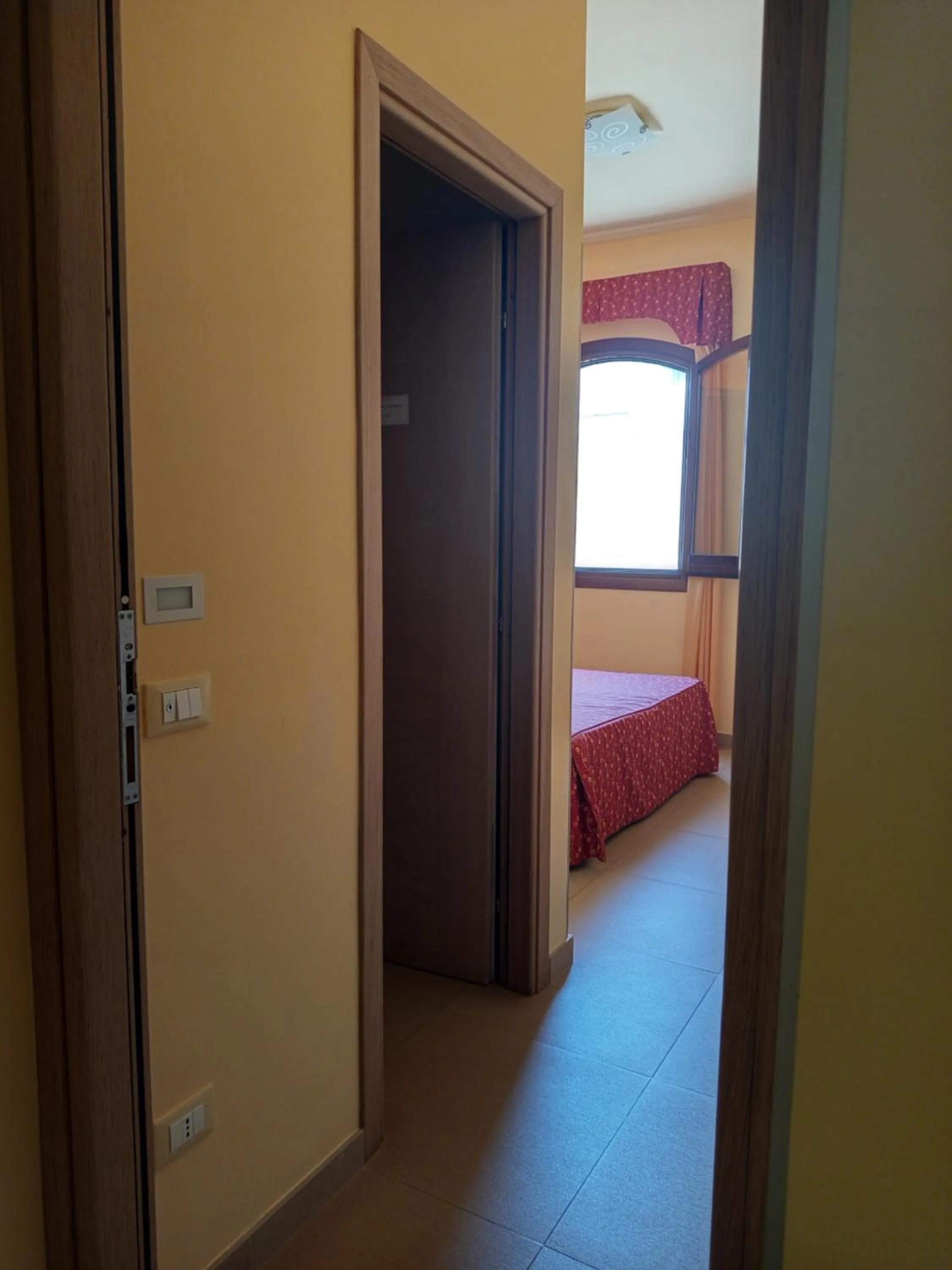 Bedroom in Amaryllis Hotel