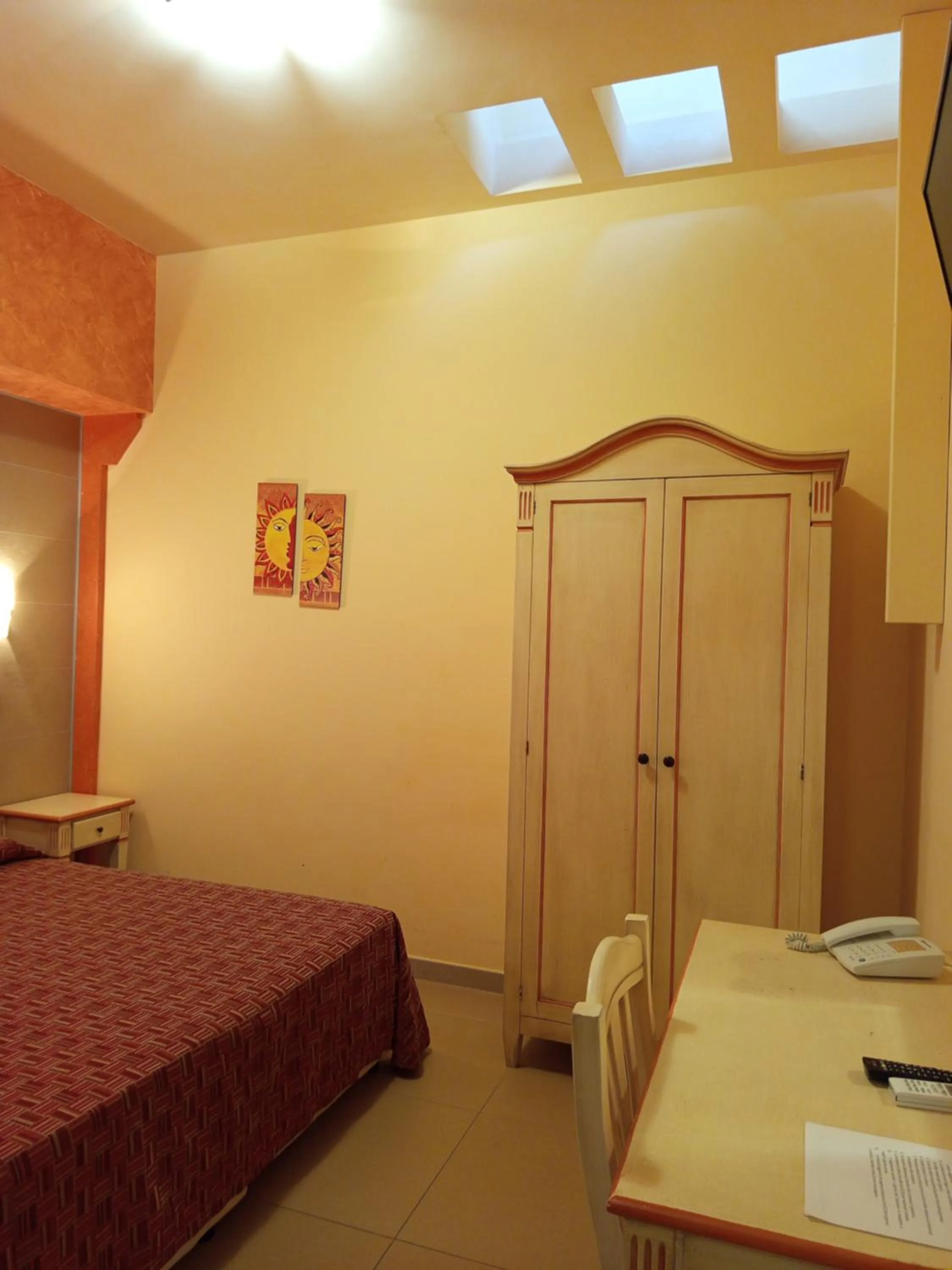 Bed in Amaryllis Hotel