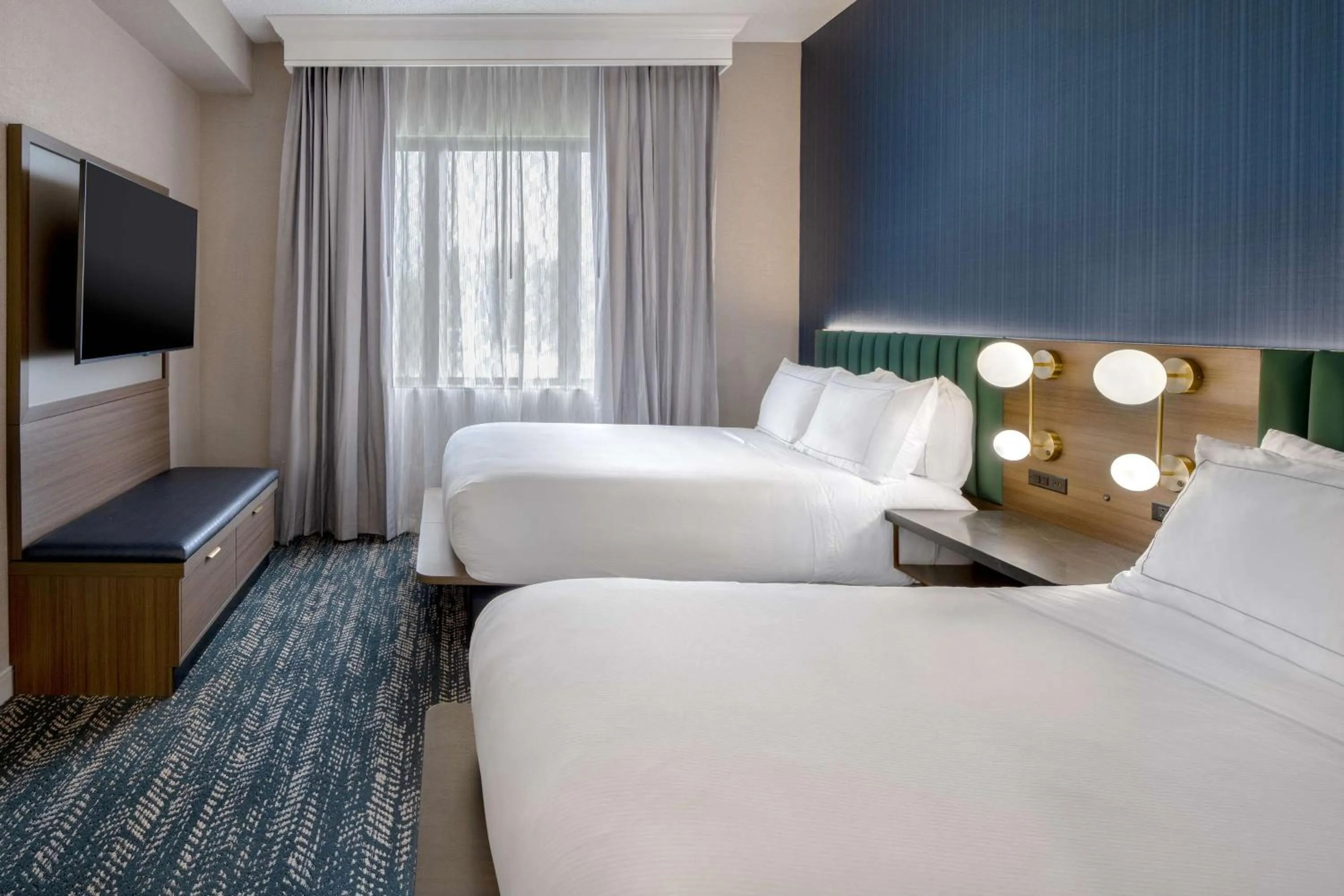 Bed in DoubleTree Suites by Hilton Mount Laurel