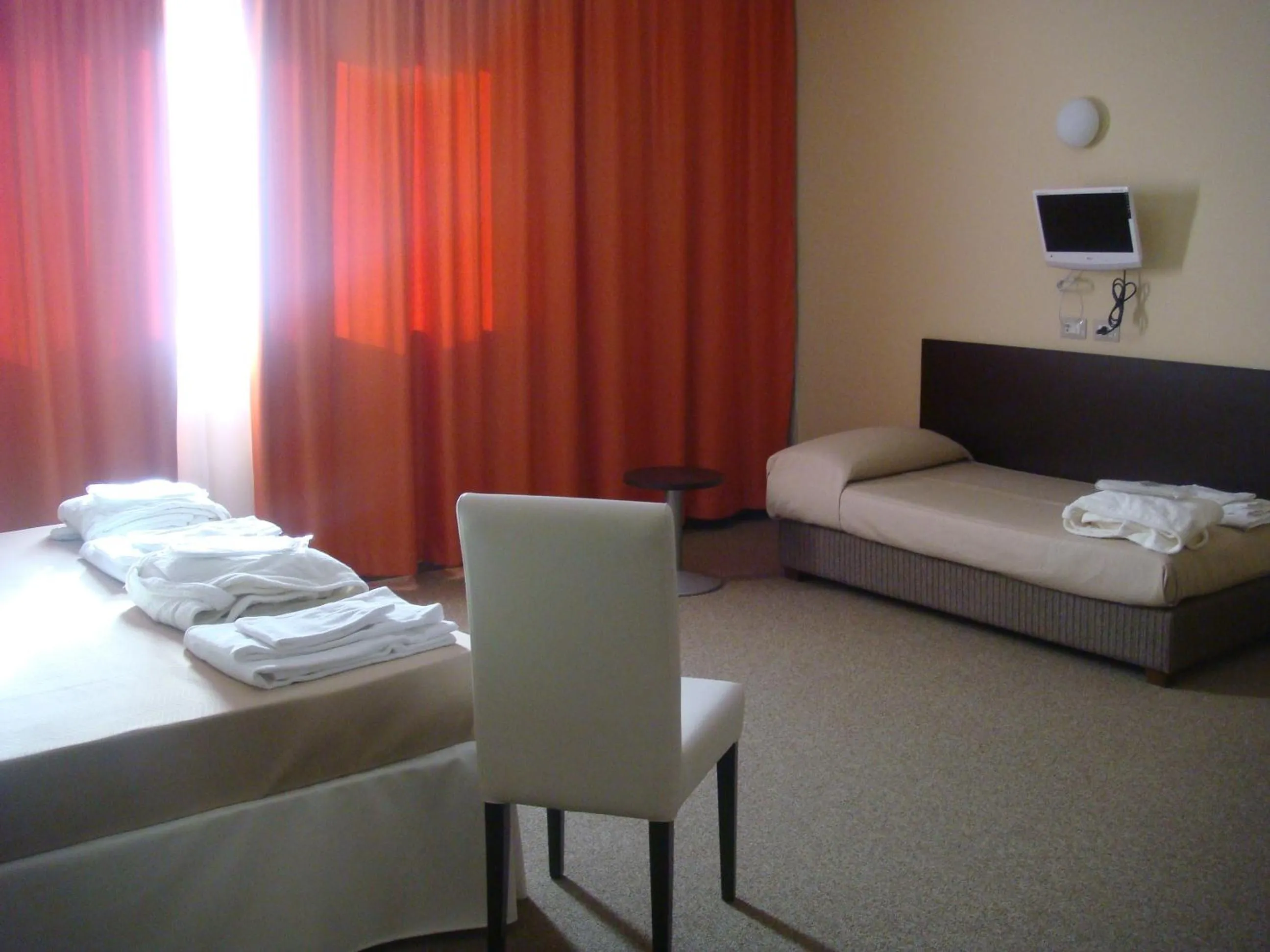 Photo of the whole room, Bed in Santa Loja Hotel Residence