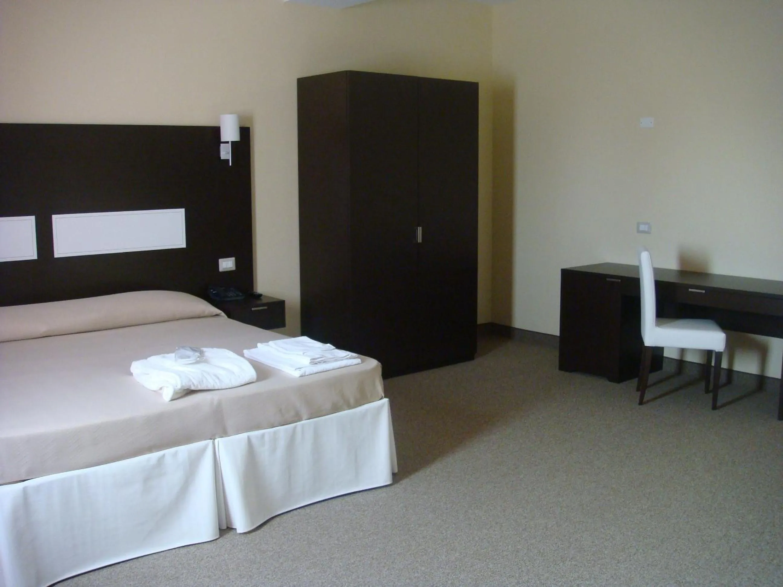 Photo of the whole room, Bed in Santa Loja Hotel Residence