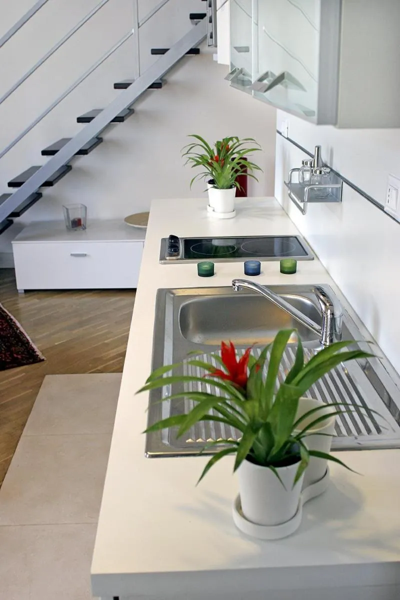 Kitchen or kitchenette in Ognina Residence