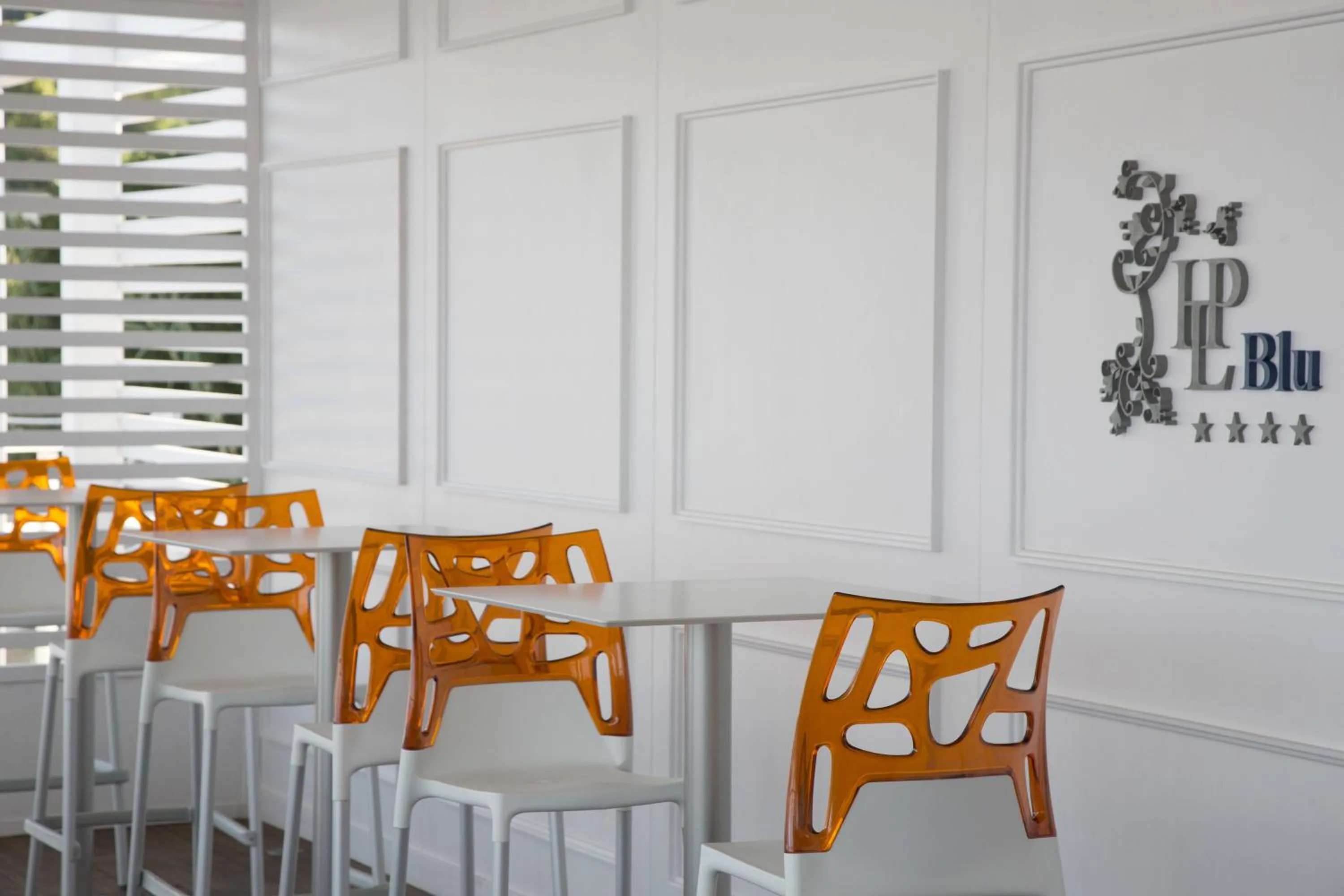 Property logo or sign in La Pineta Hotel Beach & Spa