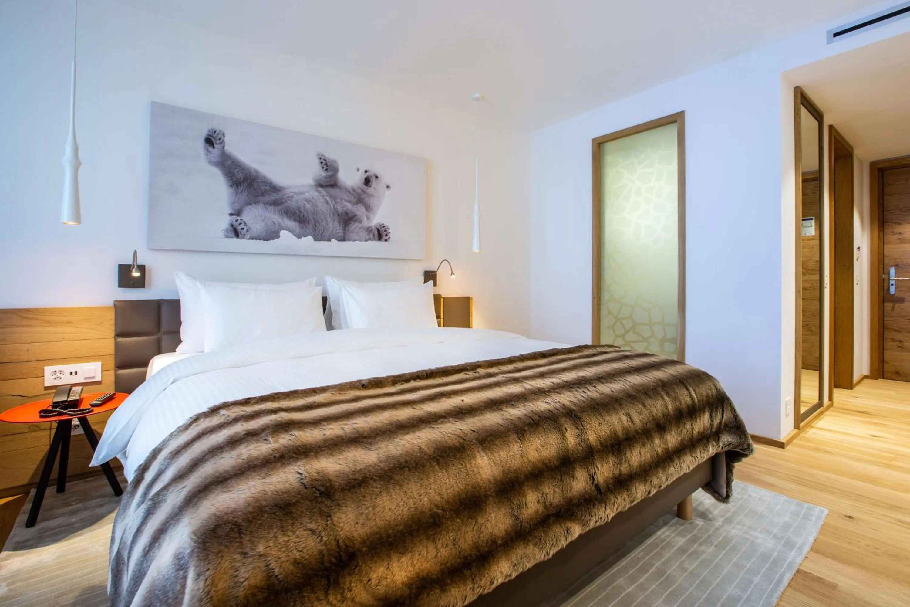 Photo of the whole room, Bed in Radisson Blu Hotel Reussen, Andermatt