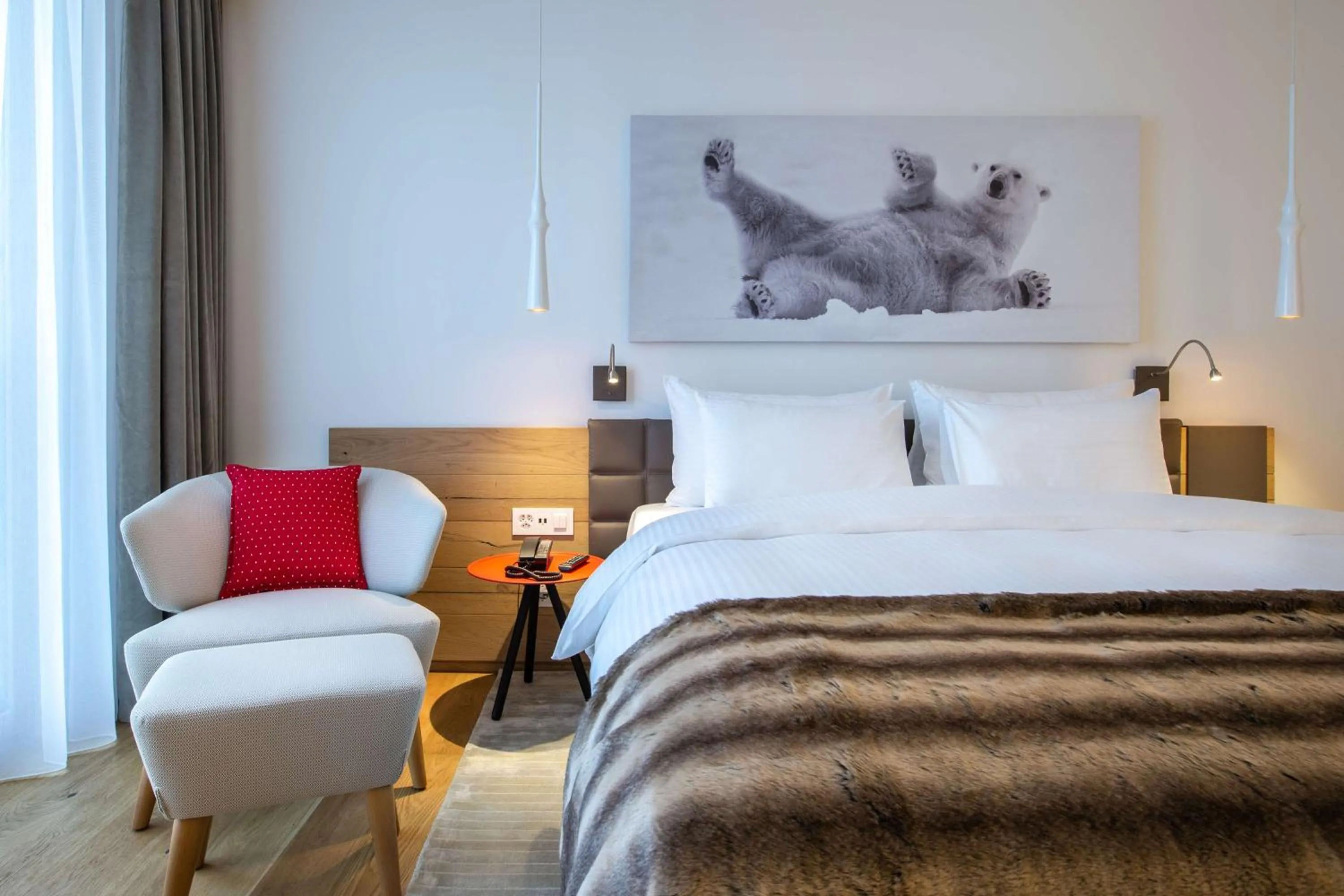 Photo of the whole room, Bed in Radisson Blu Hotel Reussen, Andermatt