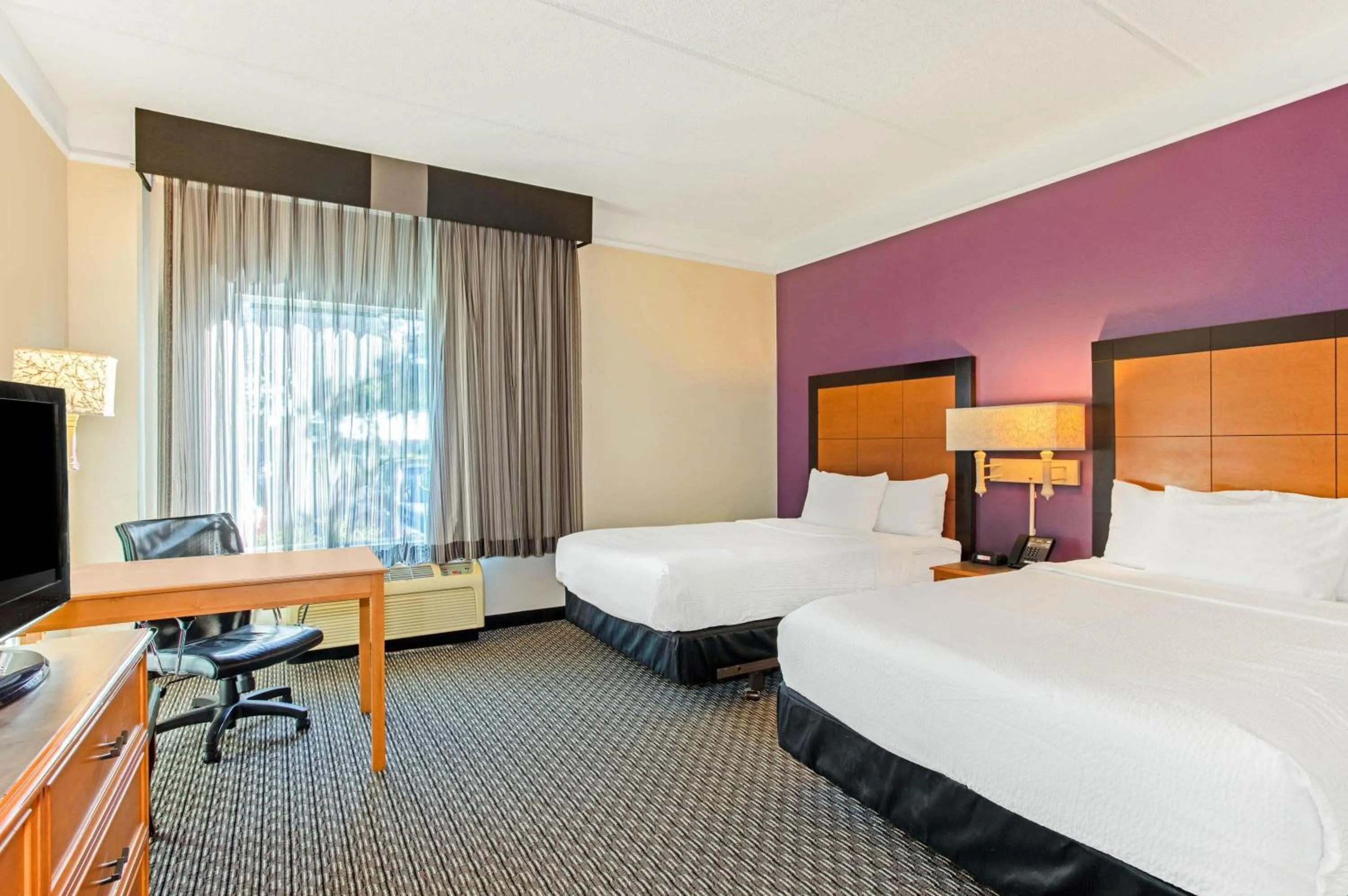 Photo of the whole room, Bed in La Quinta by Wyndham Orlando I Drive/Conv Center