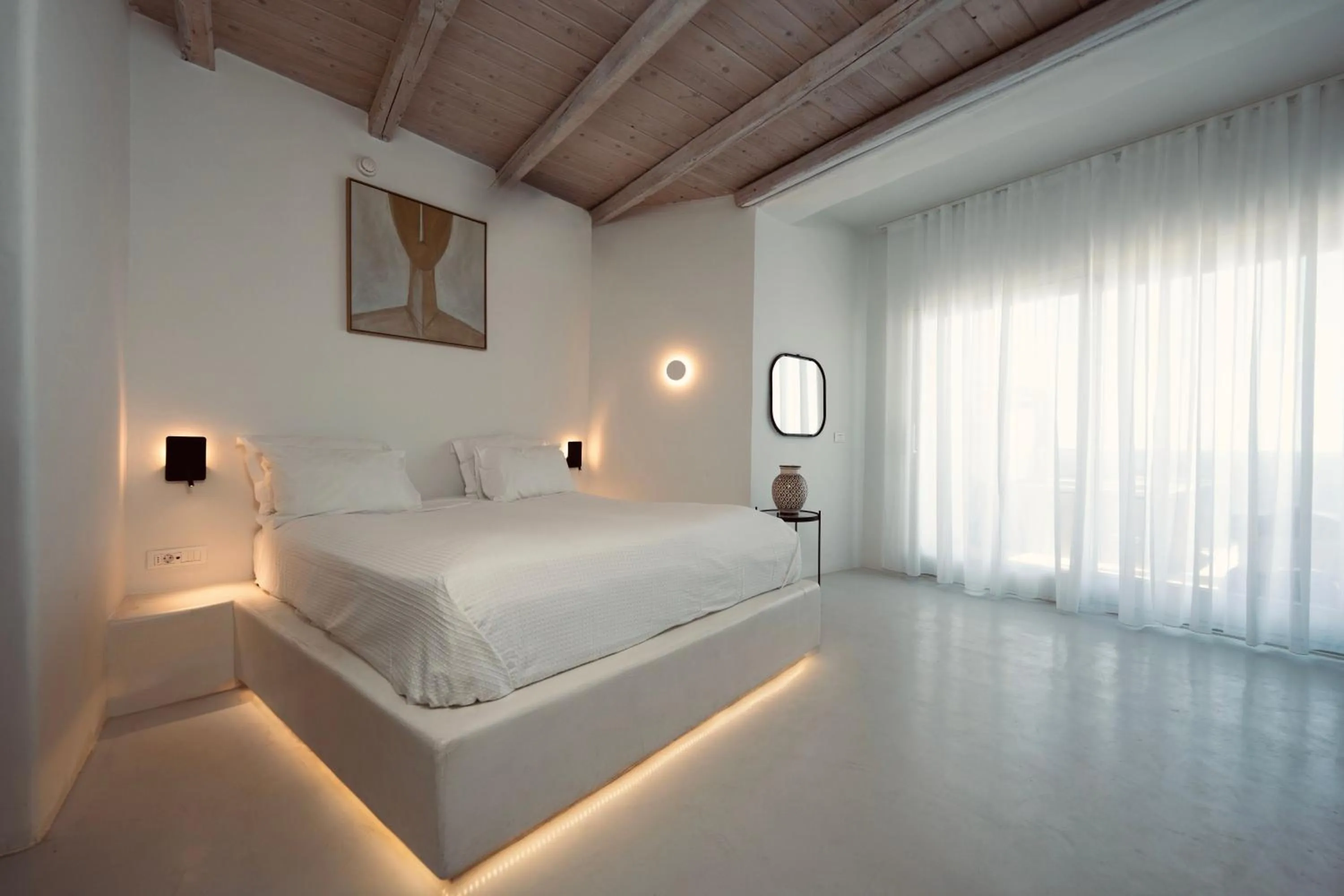 Bed in Rocabella Santorini Hotel & Spa