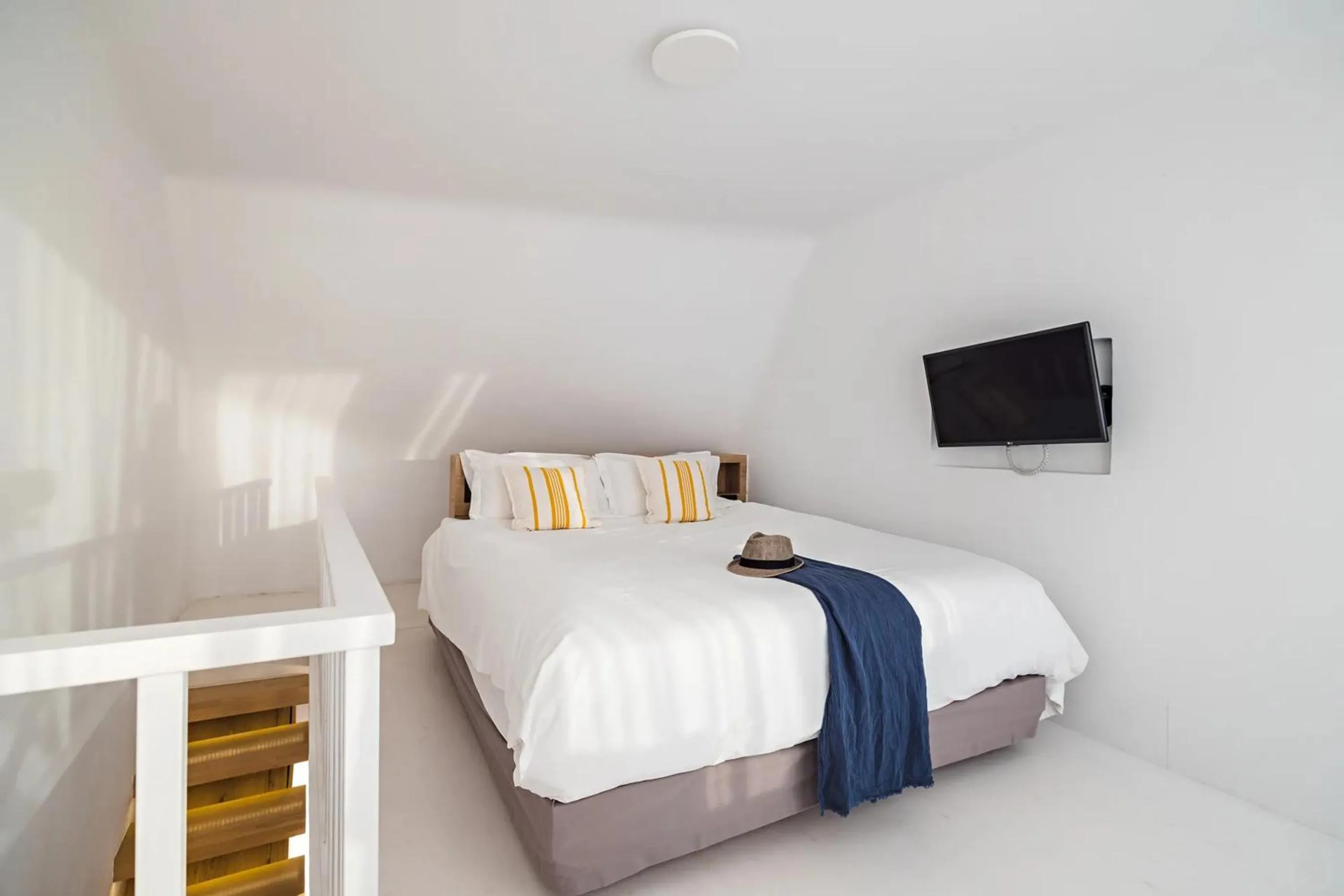 Bed in Rocabella Santorini Hotel & Spa