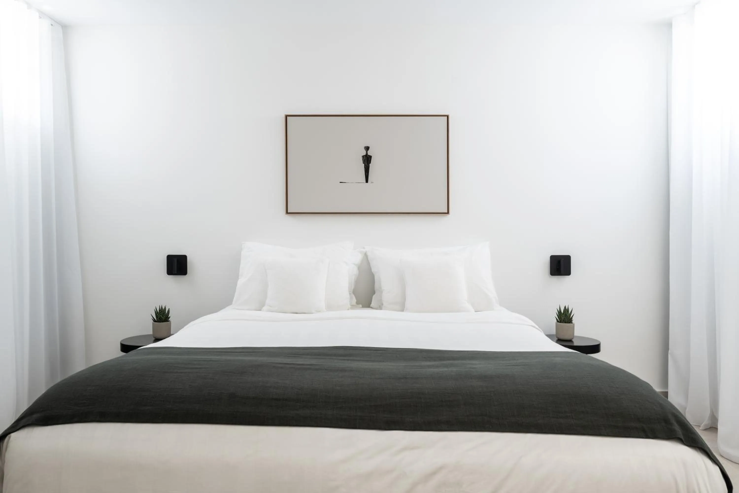 Bed in Rocabella Santorini Hotel & Spa