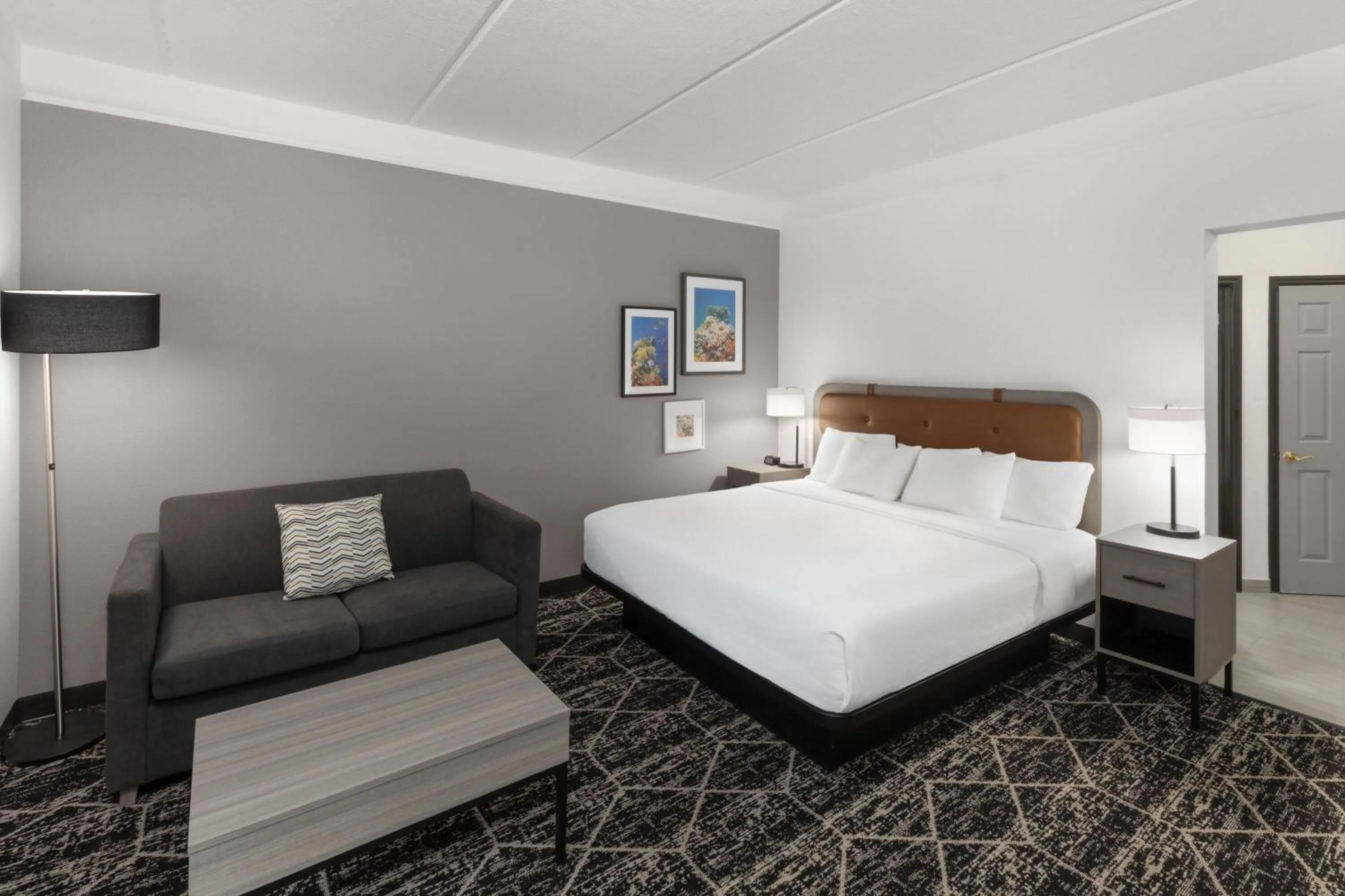 View (from property/room), Bed in La Quinta Inn & Suites by Wyndham Houston Bush IAH South