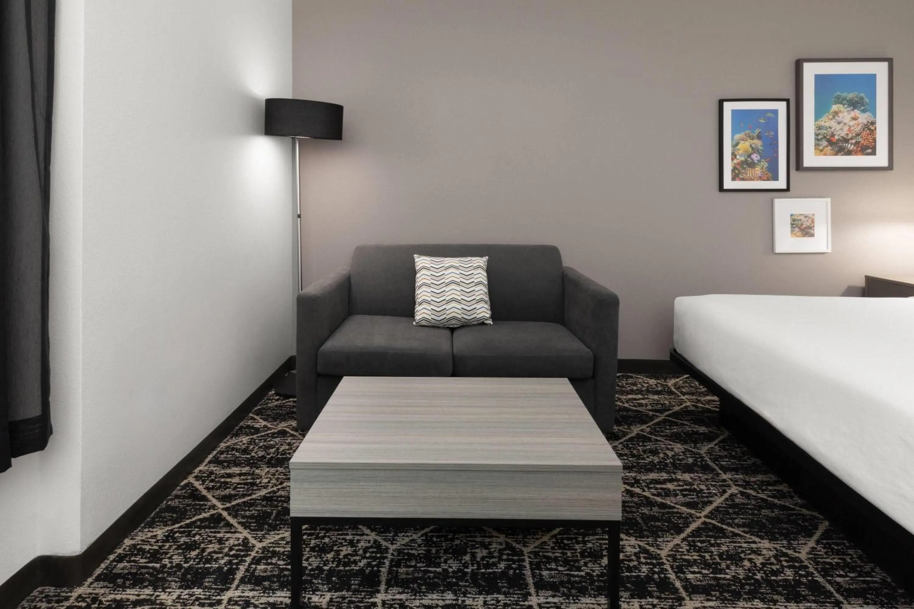 View (from property/room), Bed in La Quinta Inn & Suites by Wyndham Houston Bush IAH South