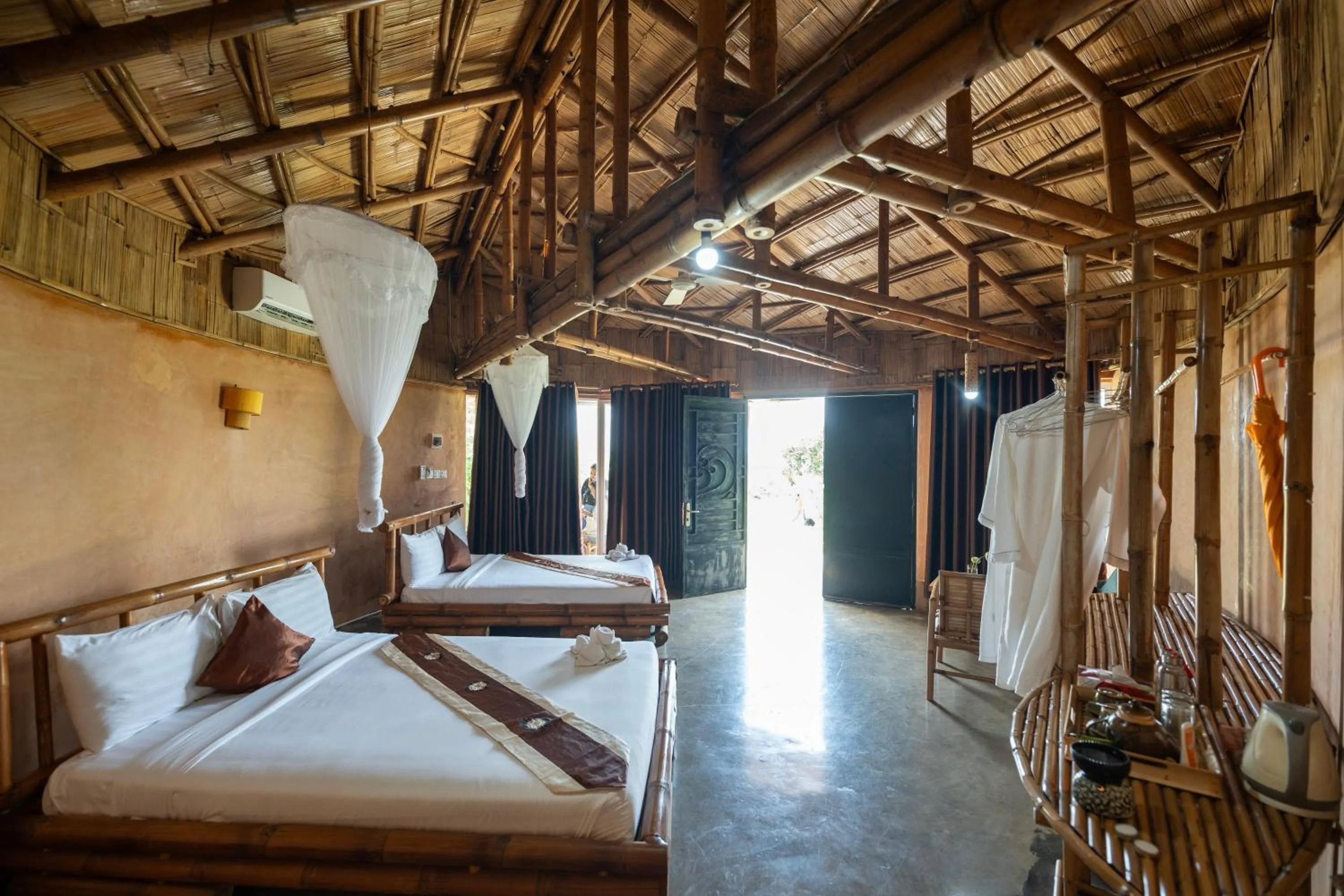 Bed in Hanchey Bamboo Resort