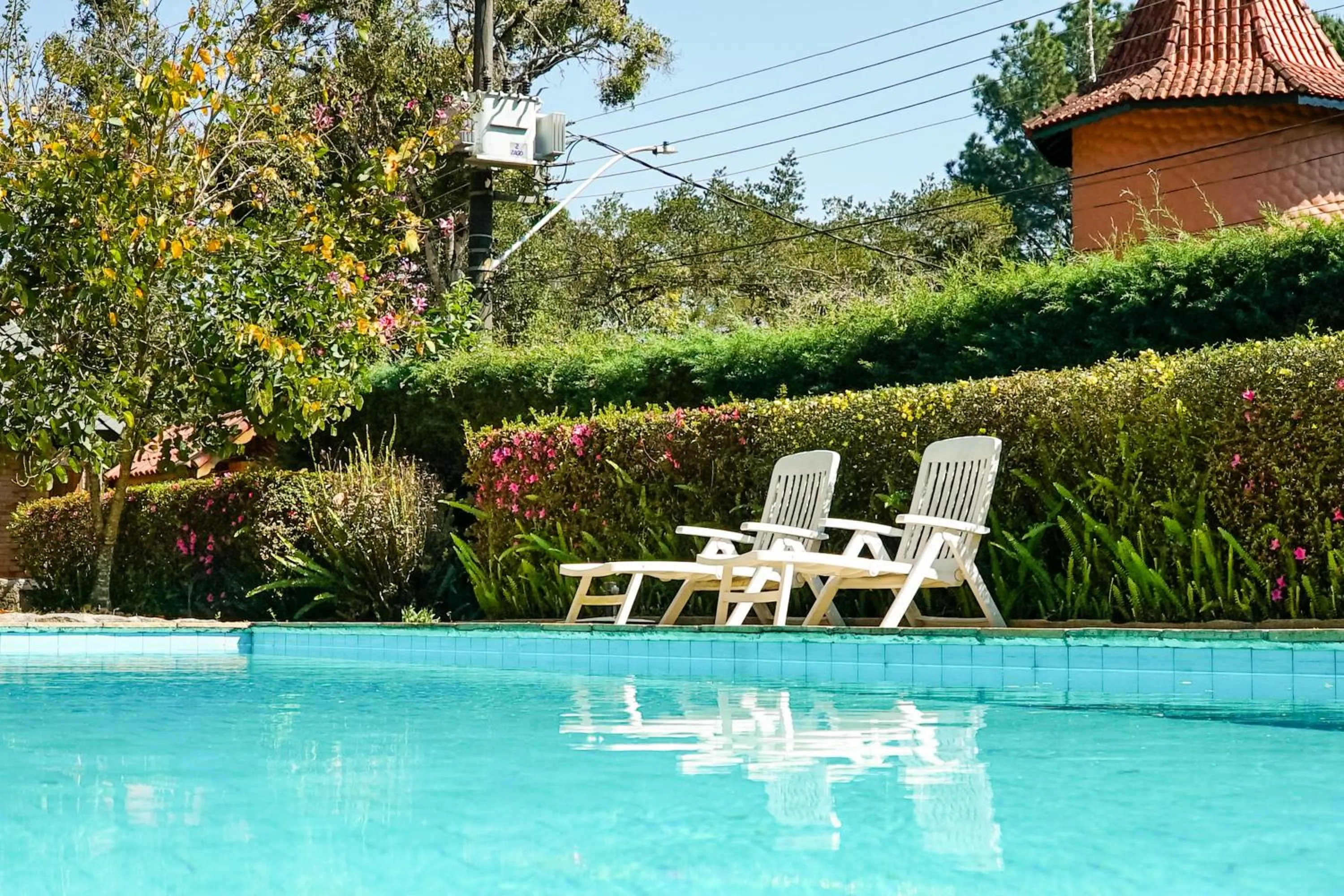 Swimming pool in VELINN Pousada Torre Branca
