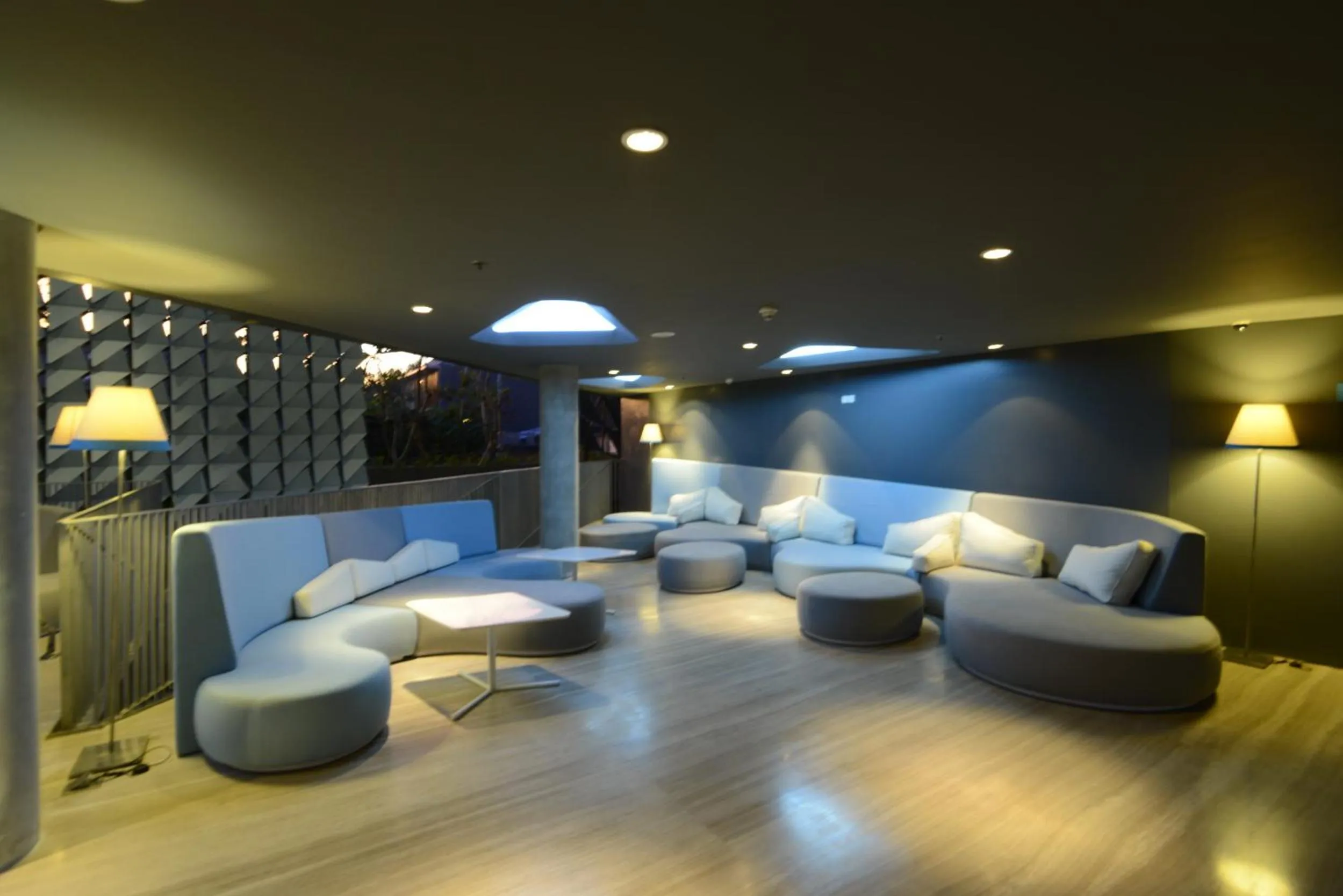 Communal lounge/ TV room in IZE Seminyak by LifestyleRetreats