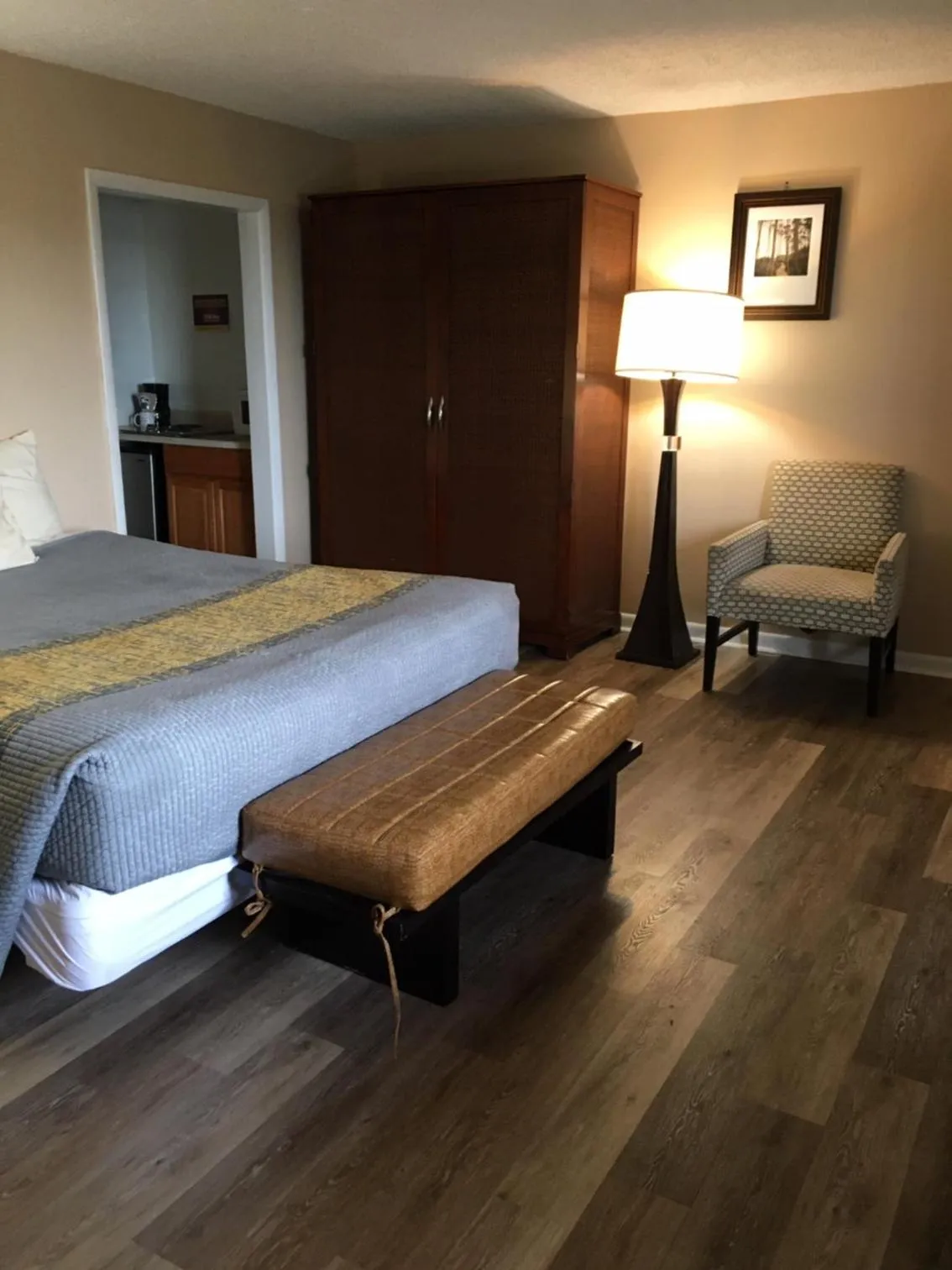 Bed in ANS INN & SUITES