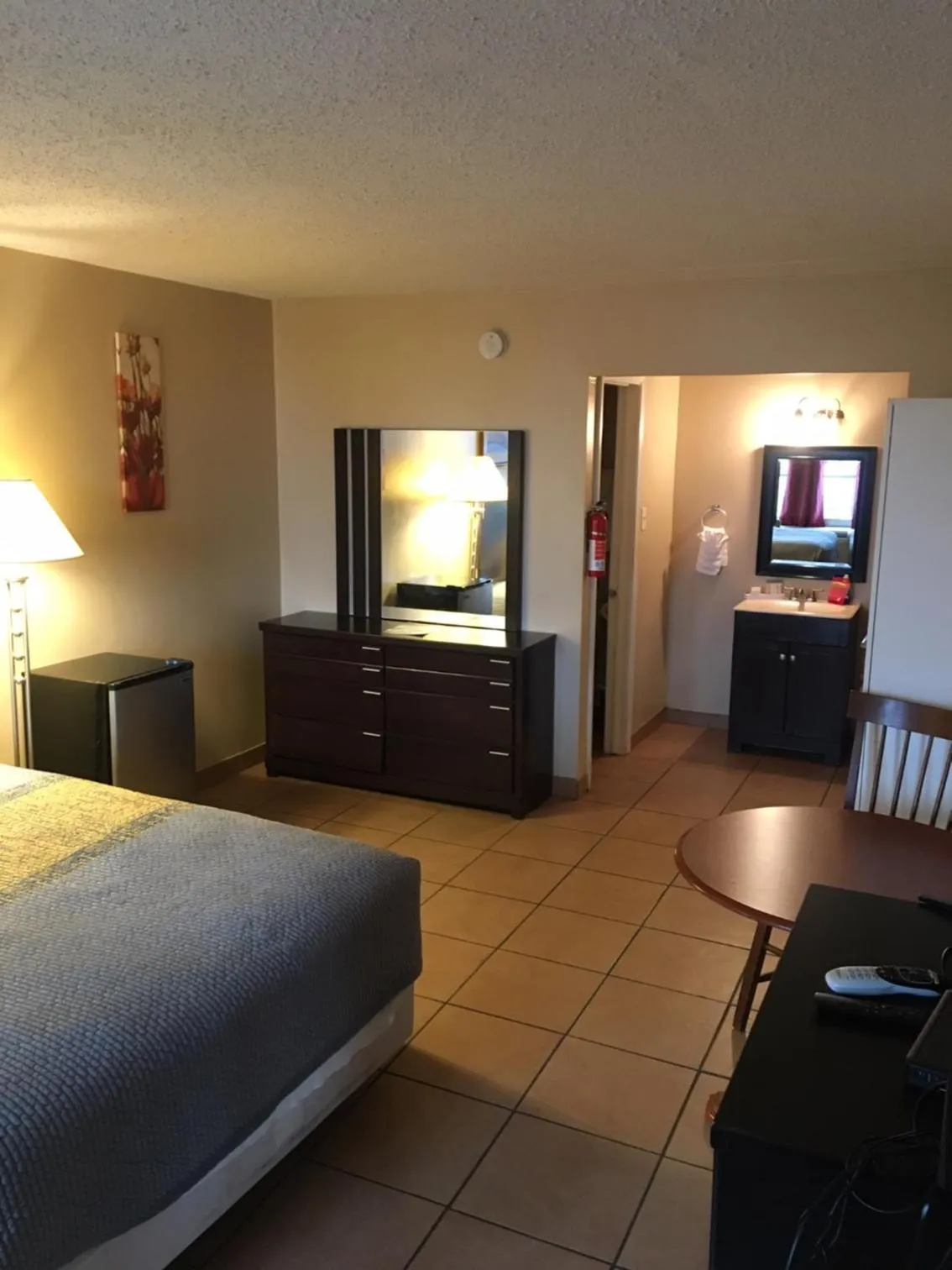 Bed in ANS INN & SUITES