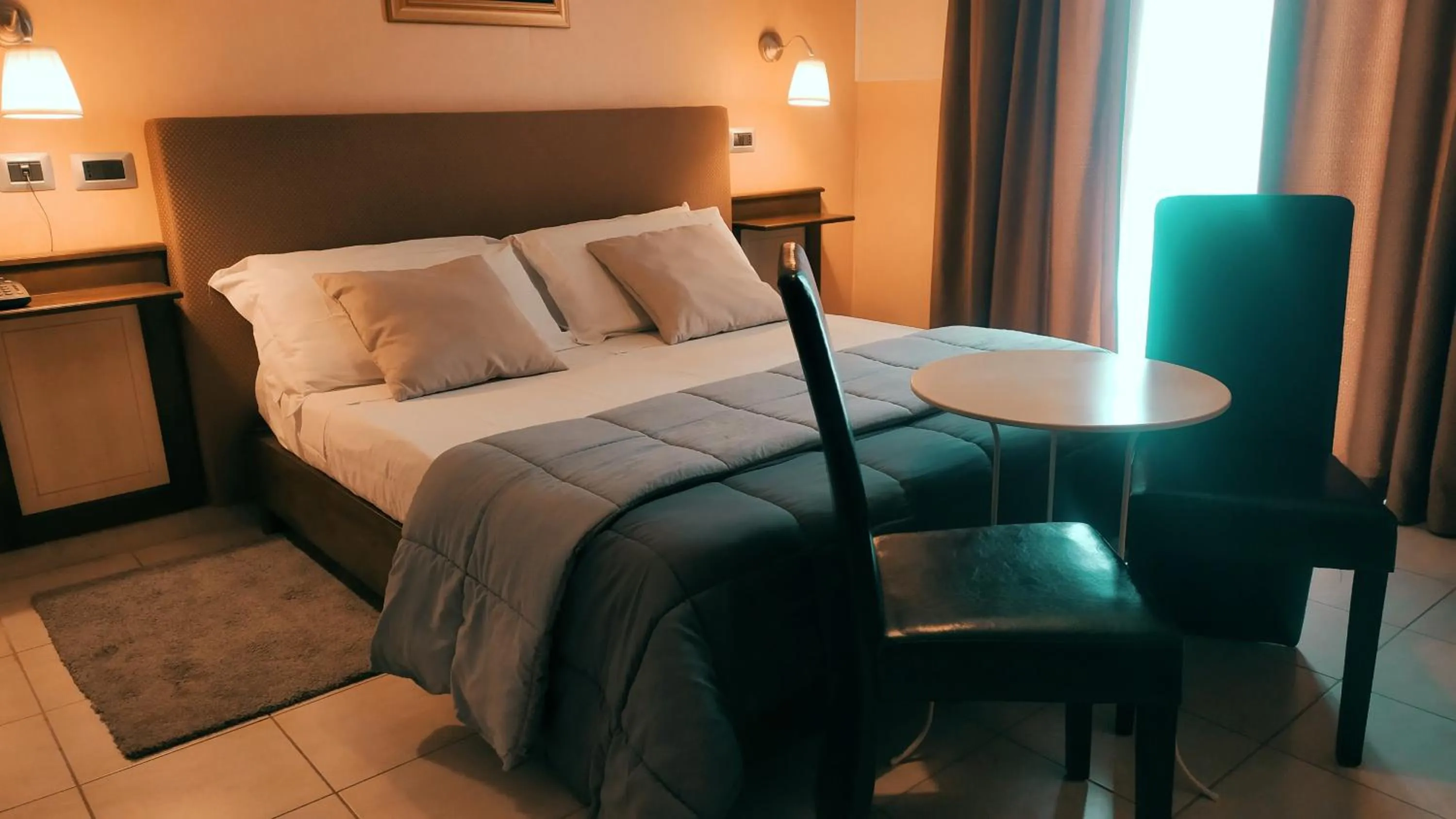 Bed in La Contessa B&B