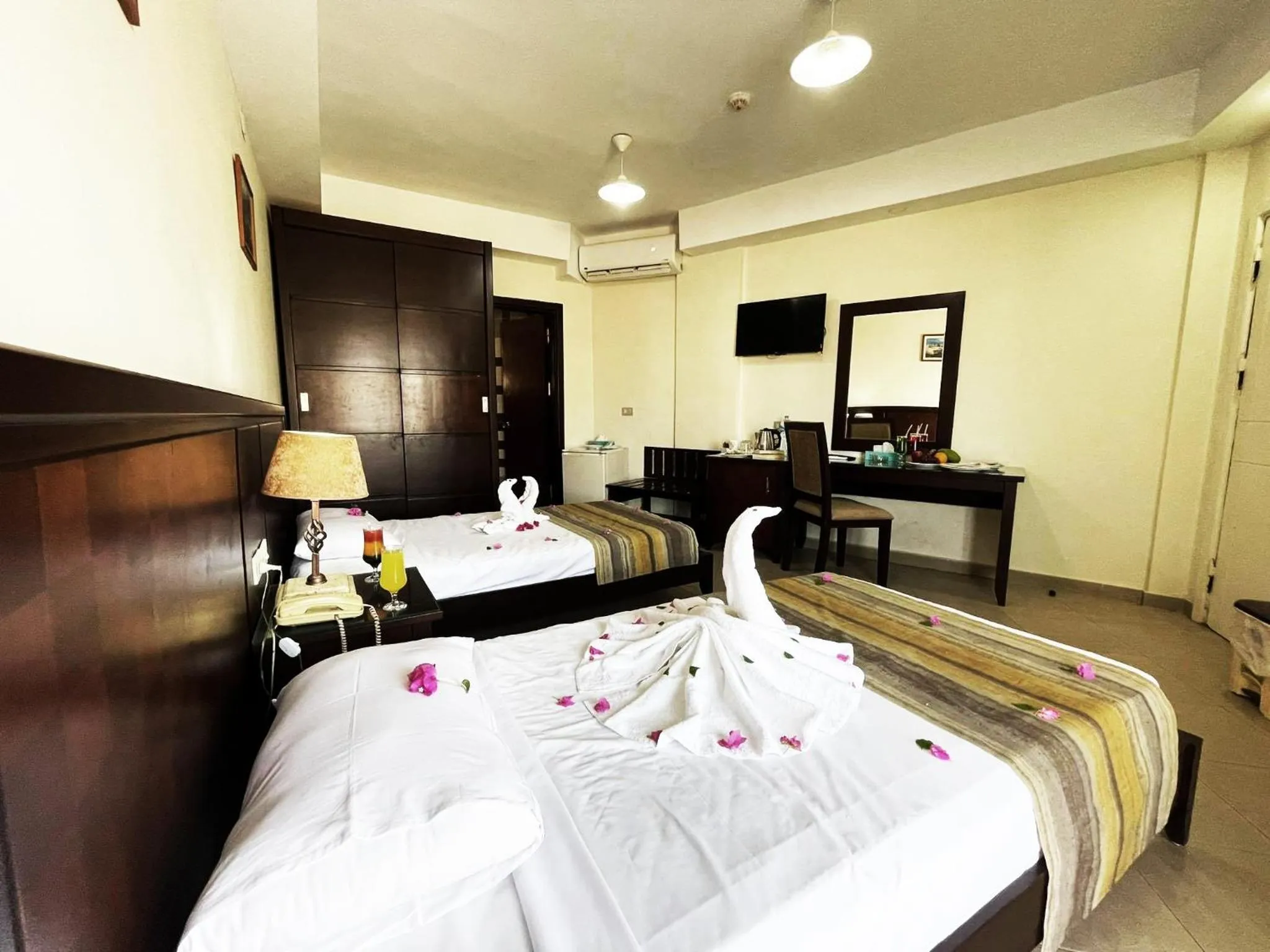 Bed in Naama Inn Hotel