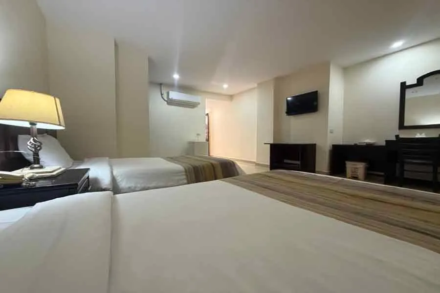 Bed in Naama Inn Hotel