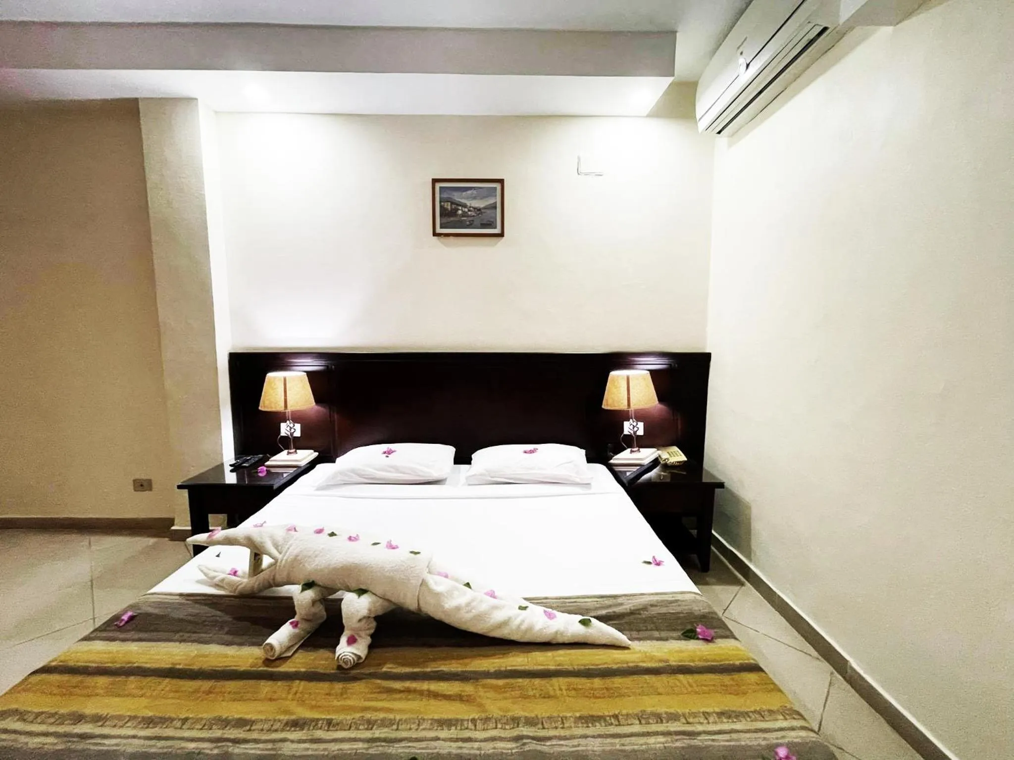 Bed in Naama Inn Hotel