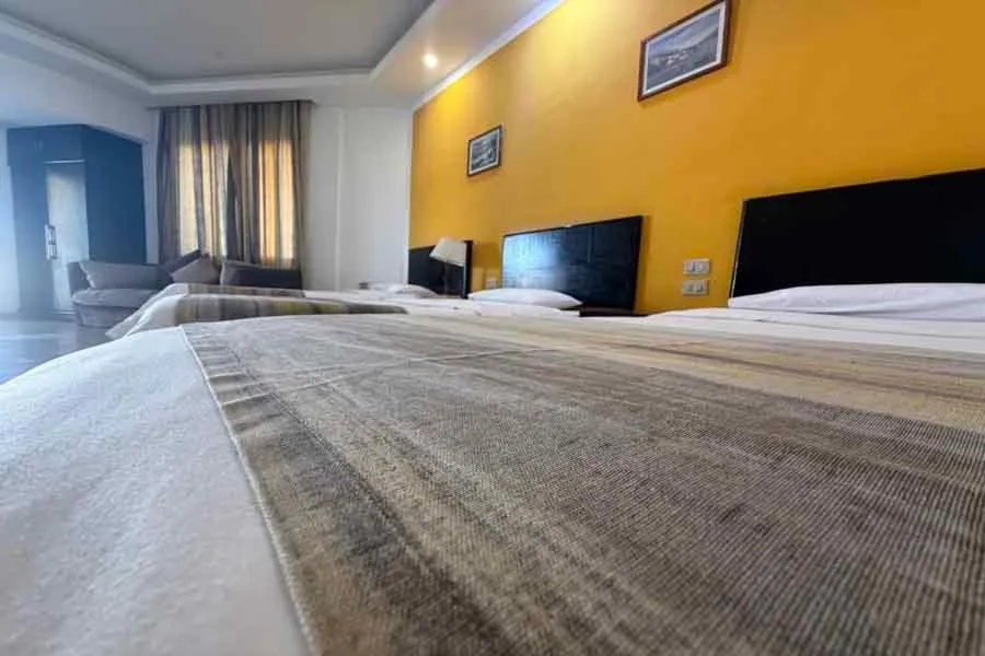 Bed in Naama Inn Hotel