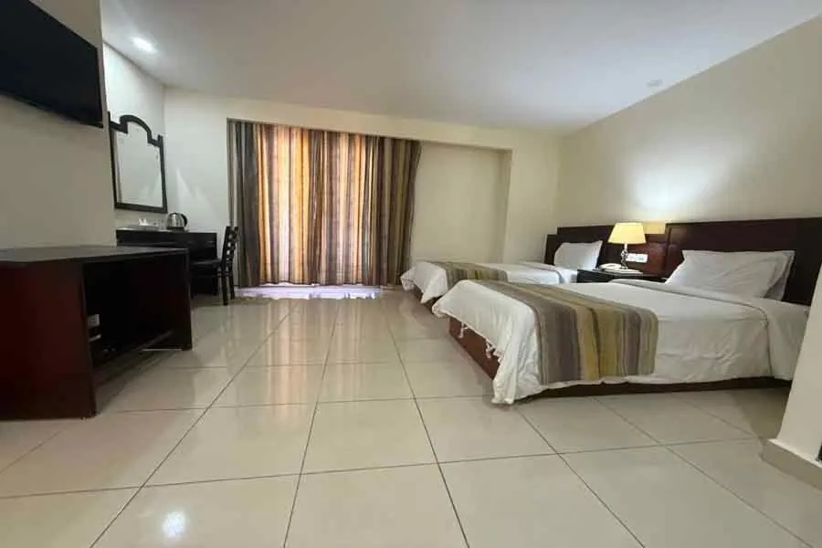 Bed in Naama Inn Hotel