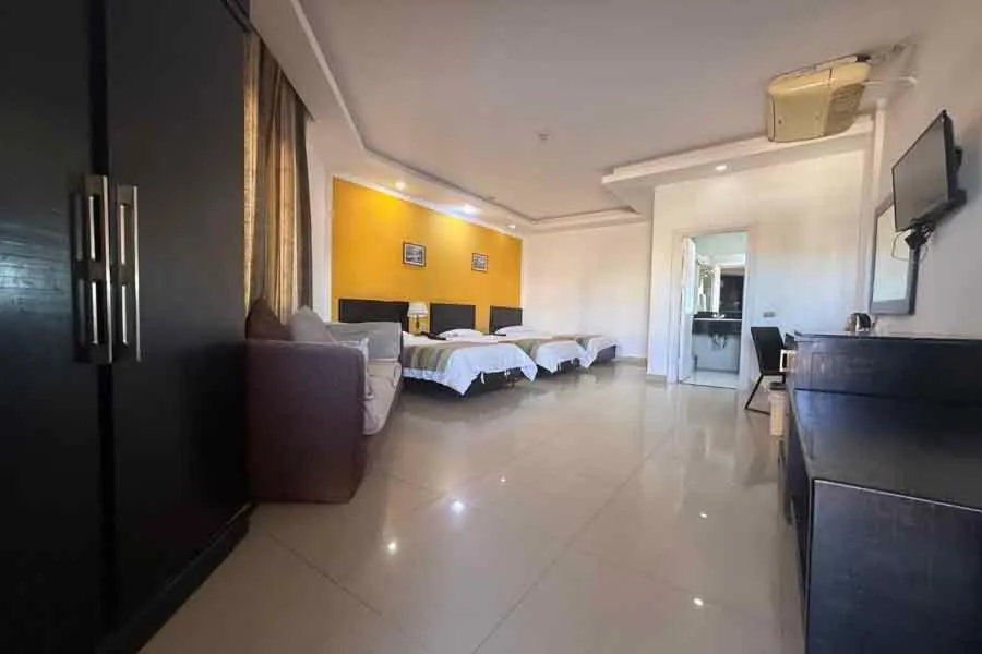 Bed in Naama Inn Hotel