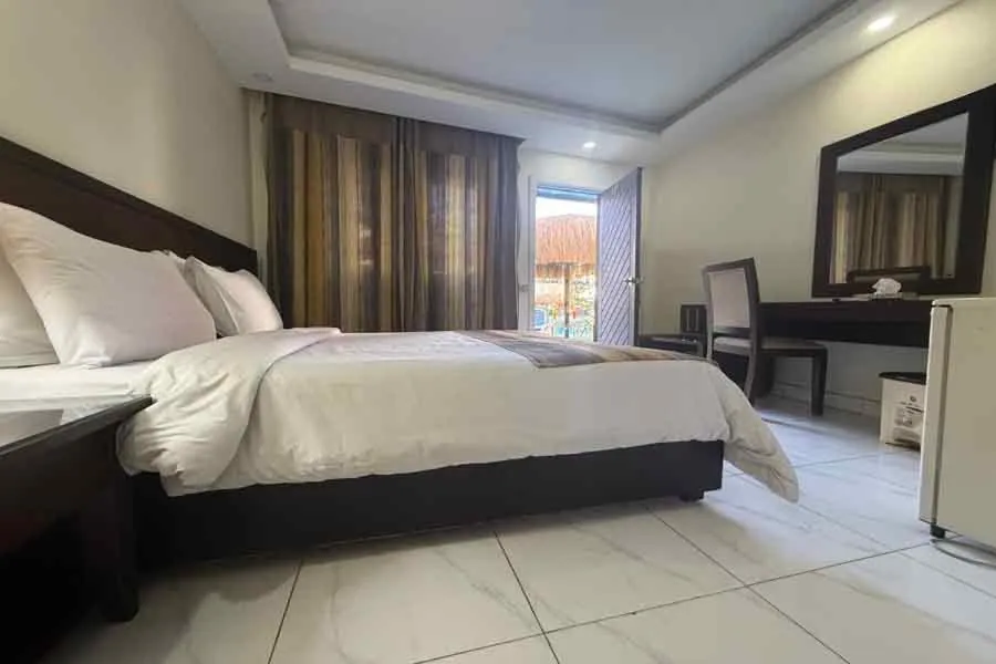 Bed in Naama Inn Hotel