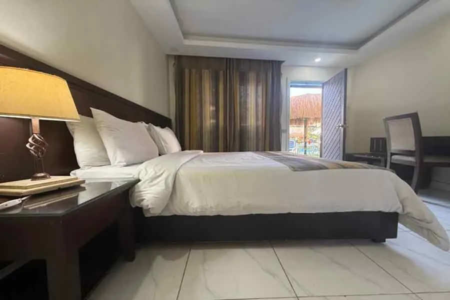 Bed in Naama Inn Hotel