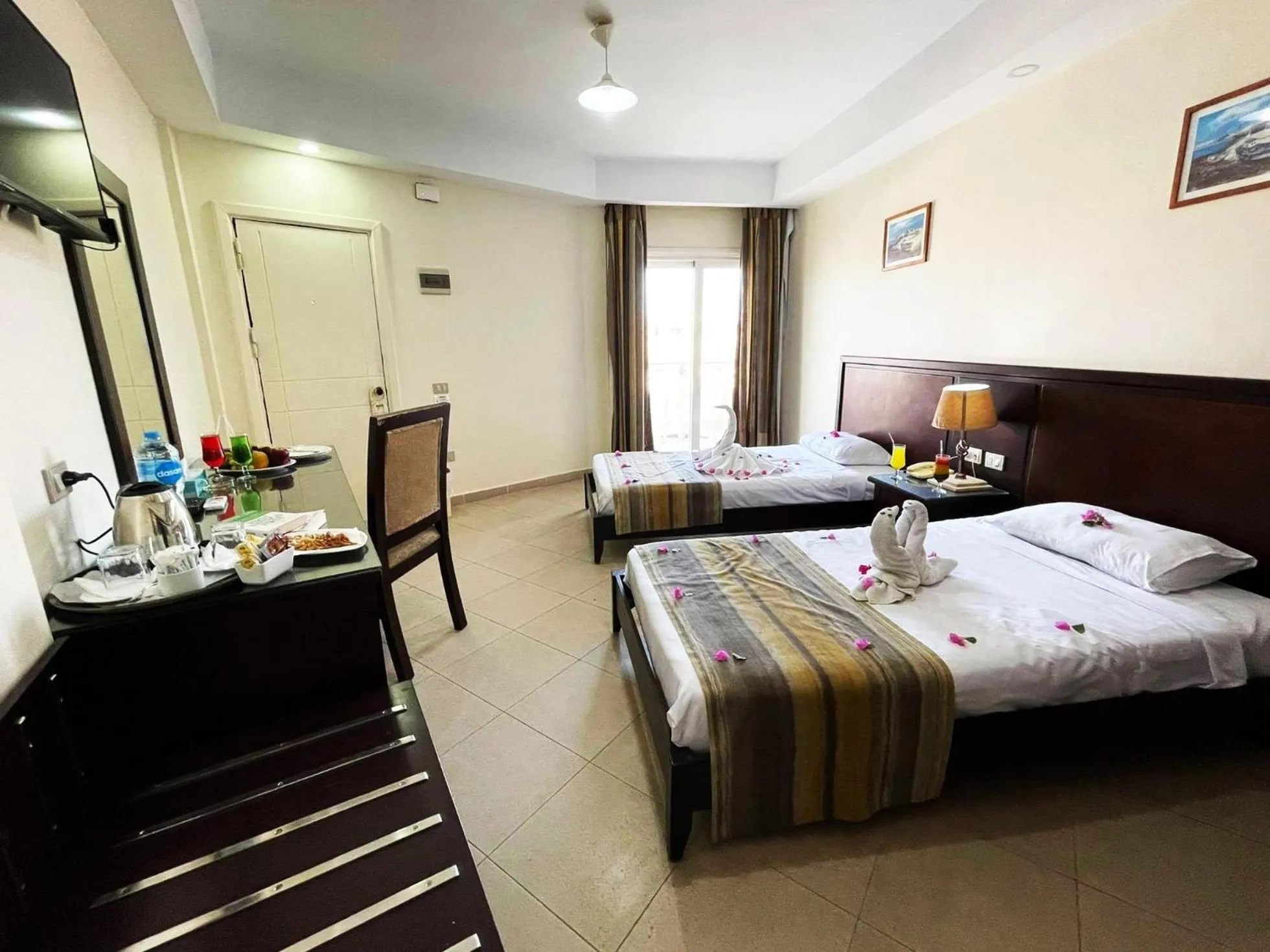 Bed in Naama Inn Hotel