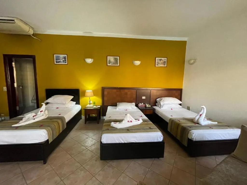 Bed in Naama Inn Hotel