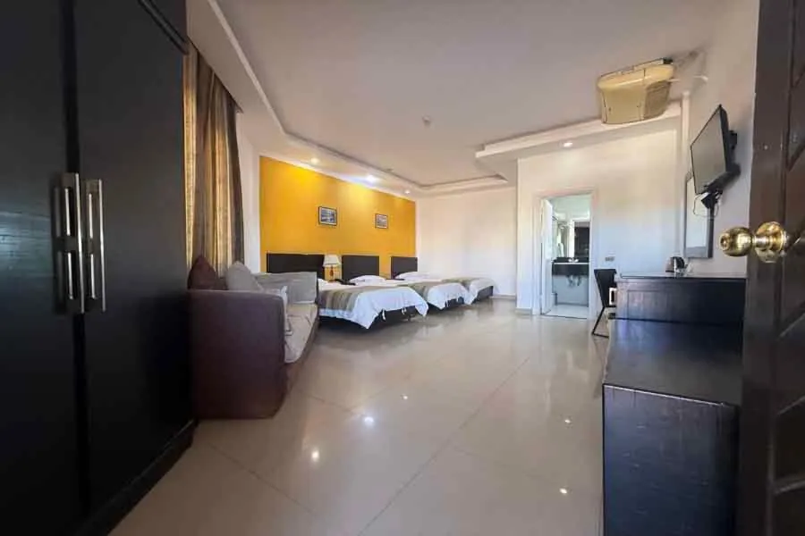 Bed in Naama Inn Hotel