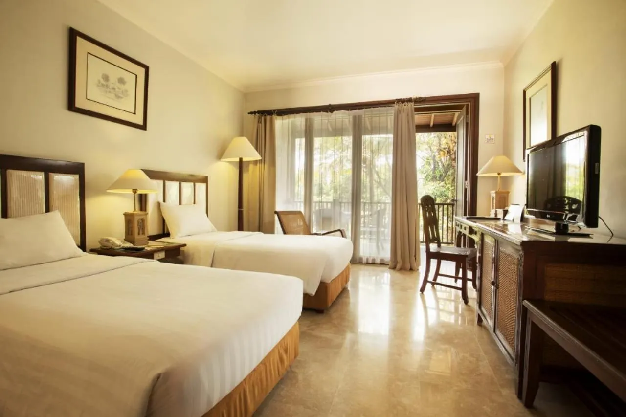 Bed in Laras Asri Resort & Spa