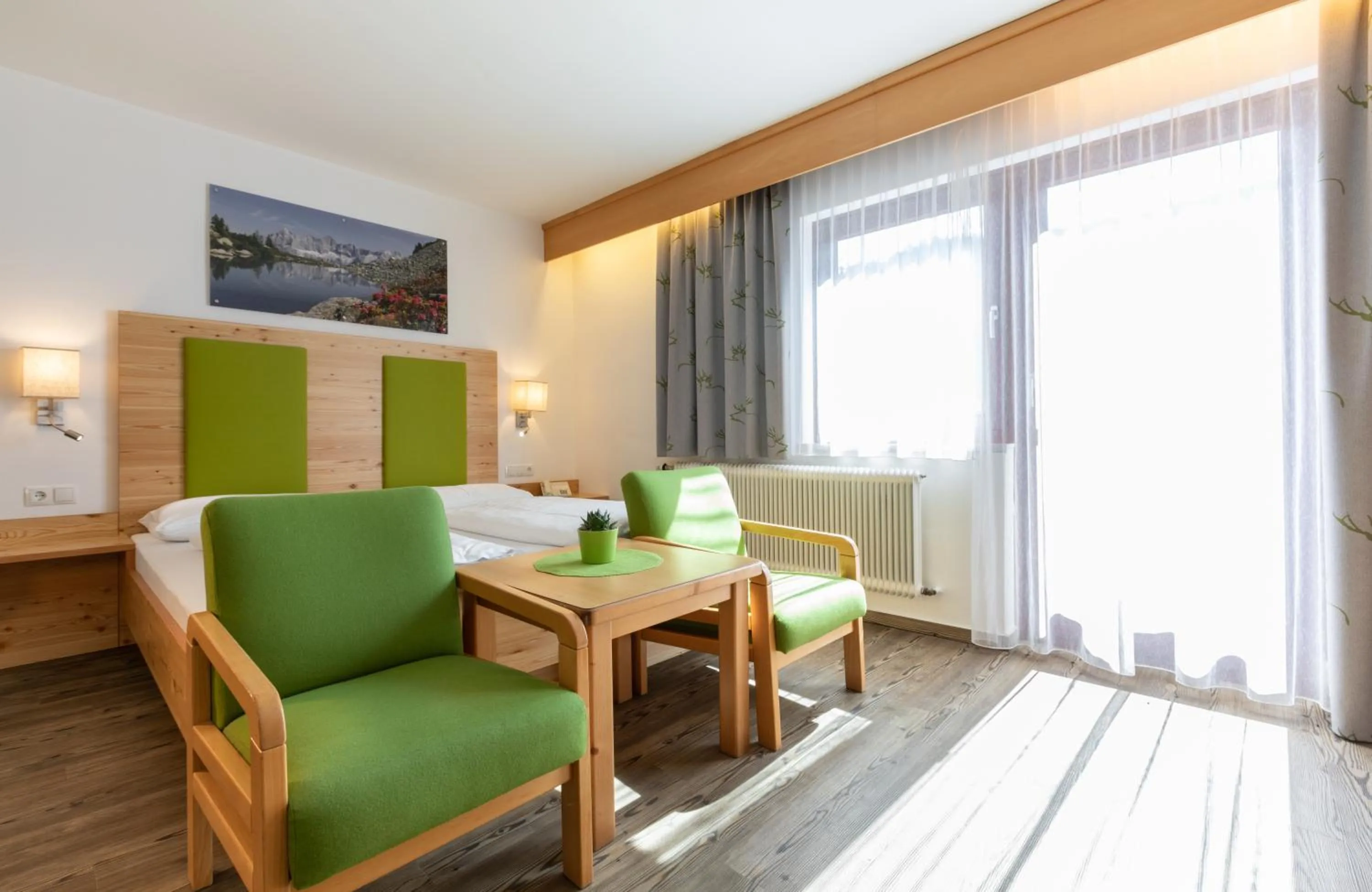 Photo of the whole room, Bed in Reiters Wohlfühlhotel