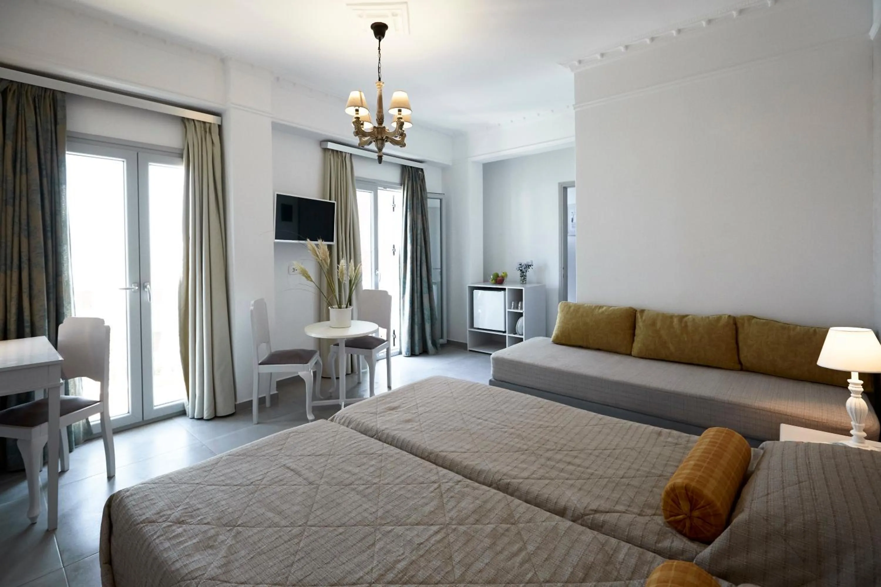 Photo of the whole room, Bed in Blue Sea Hotel