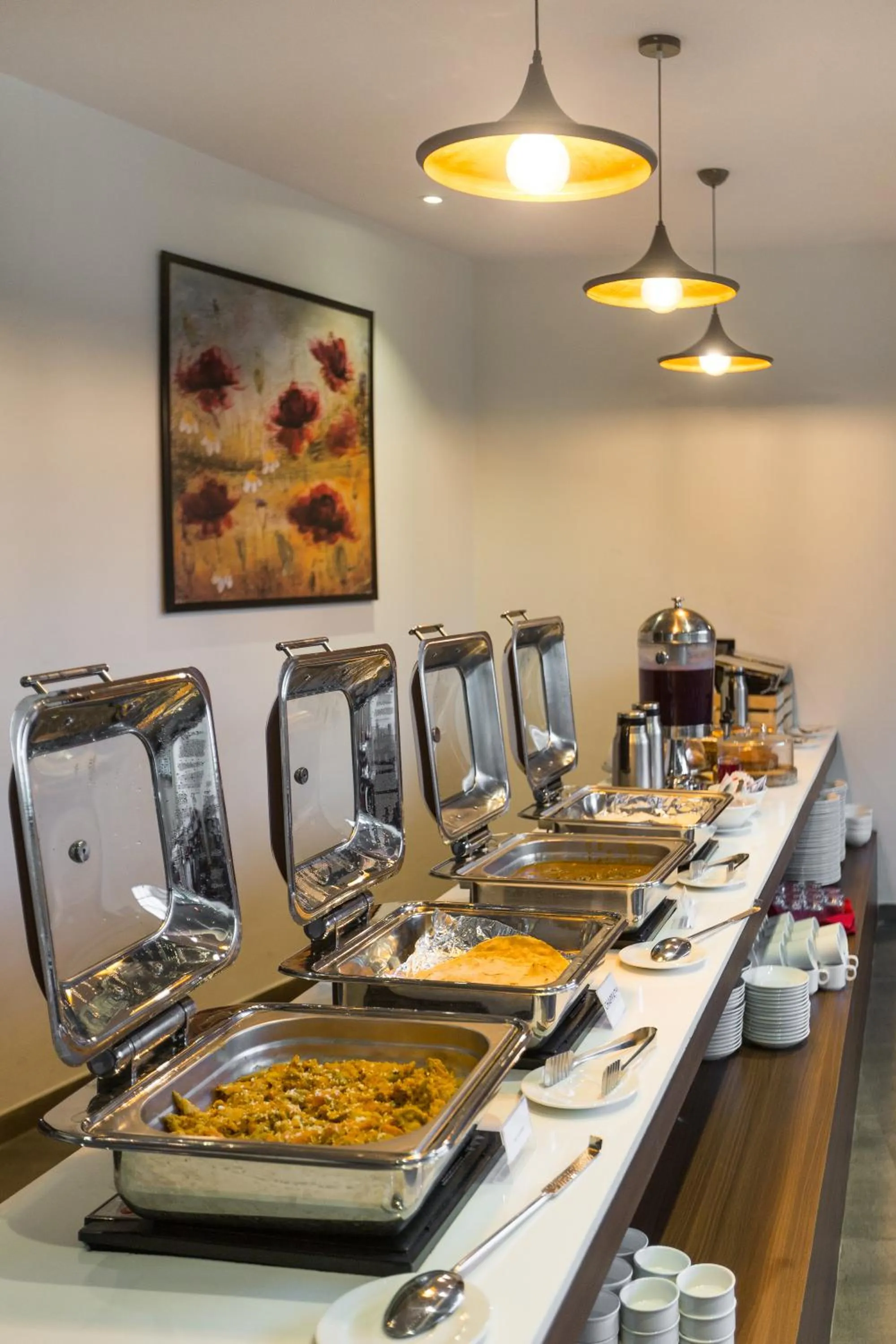 Dining area in Aura One Hotel