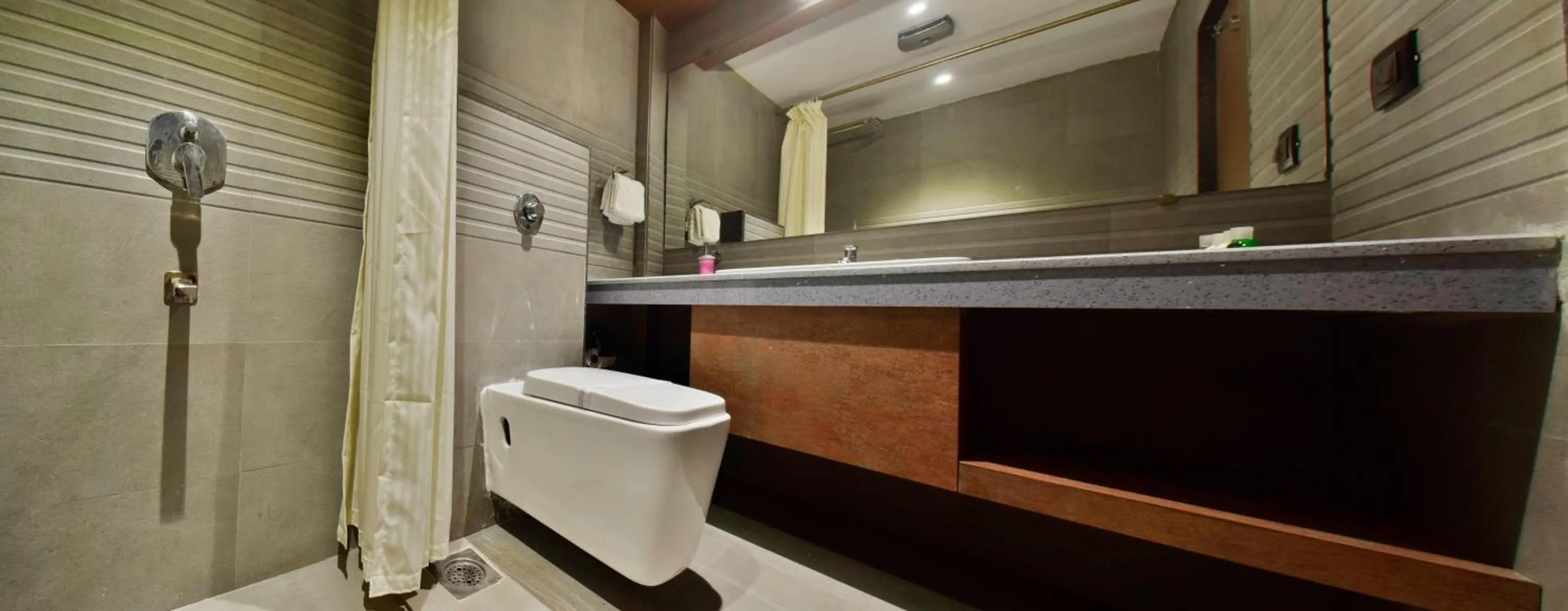 Bathroom in Aura One Hotel