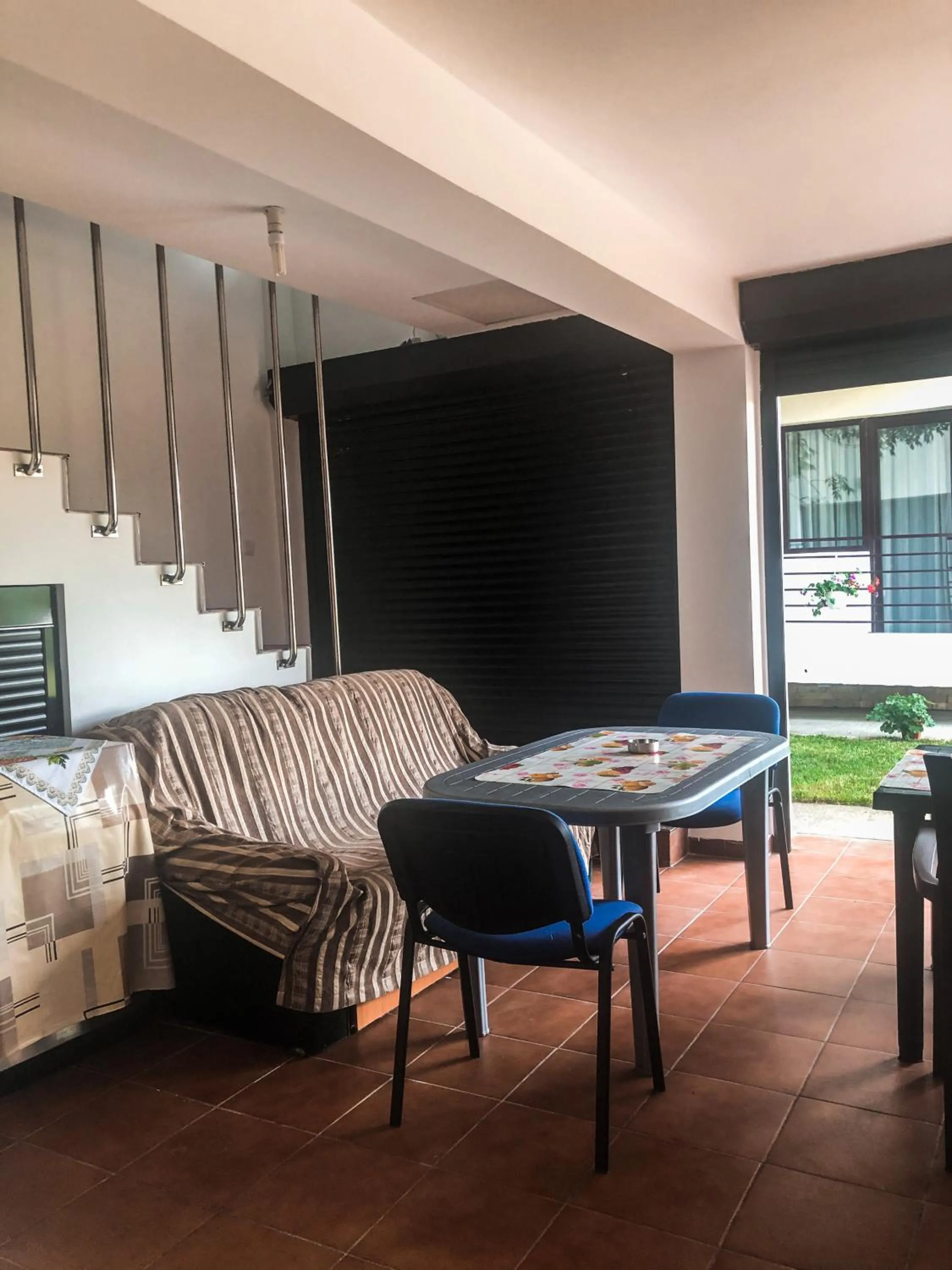 Communal lounge/ TV room in Villa Anastasia