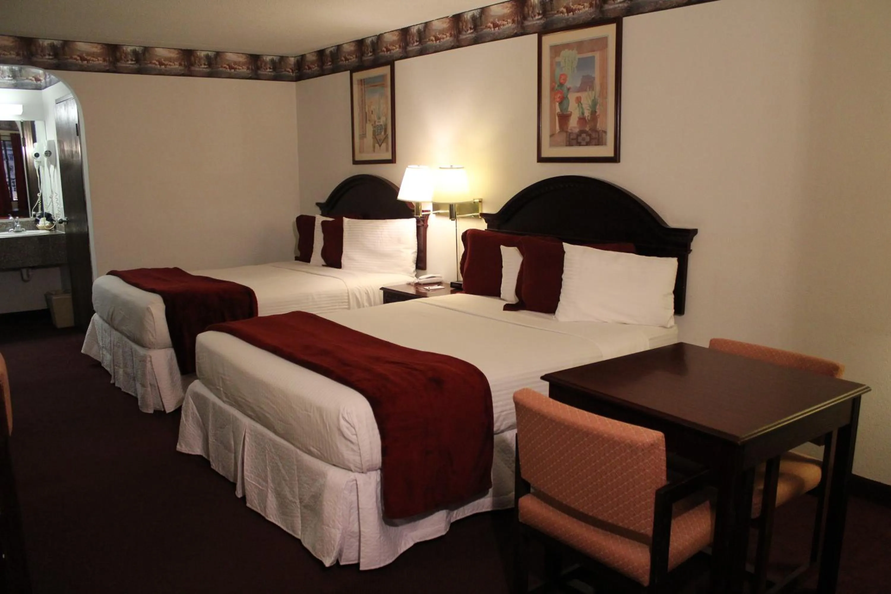 Bed in Dodge House Hotel