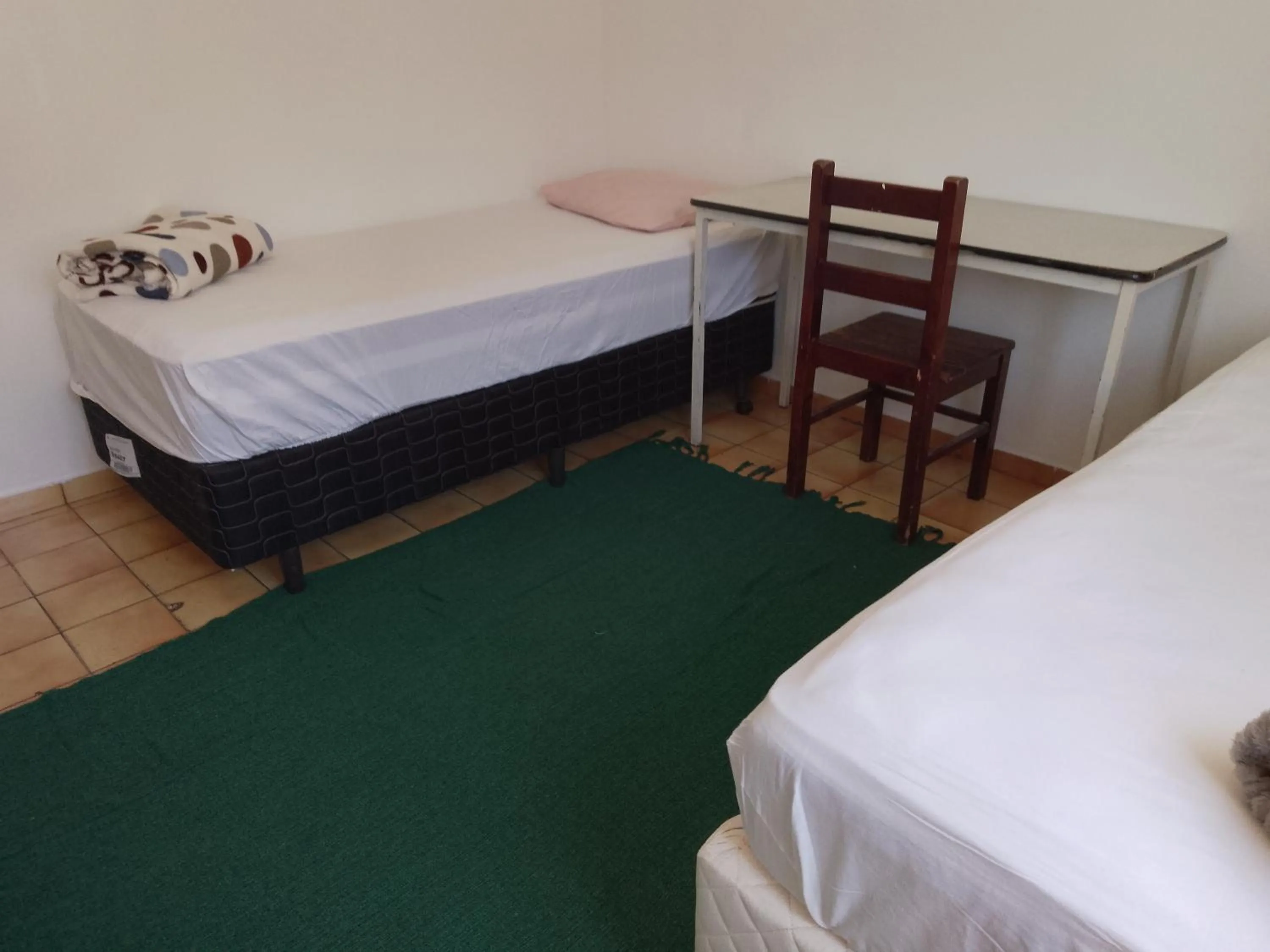 Bed in Hotel Pousada Liberdade