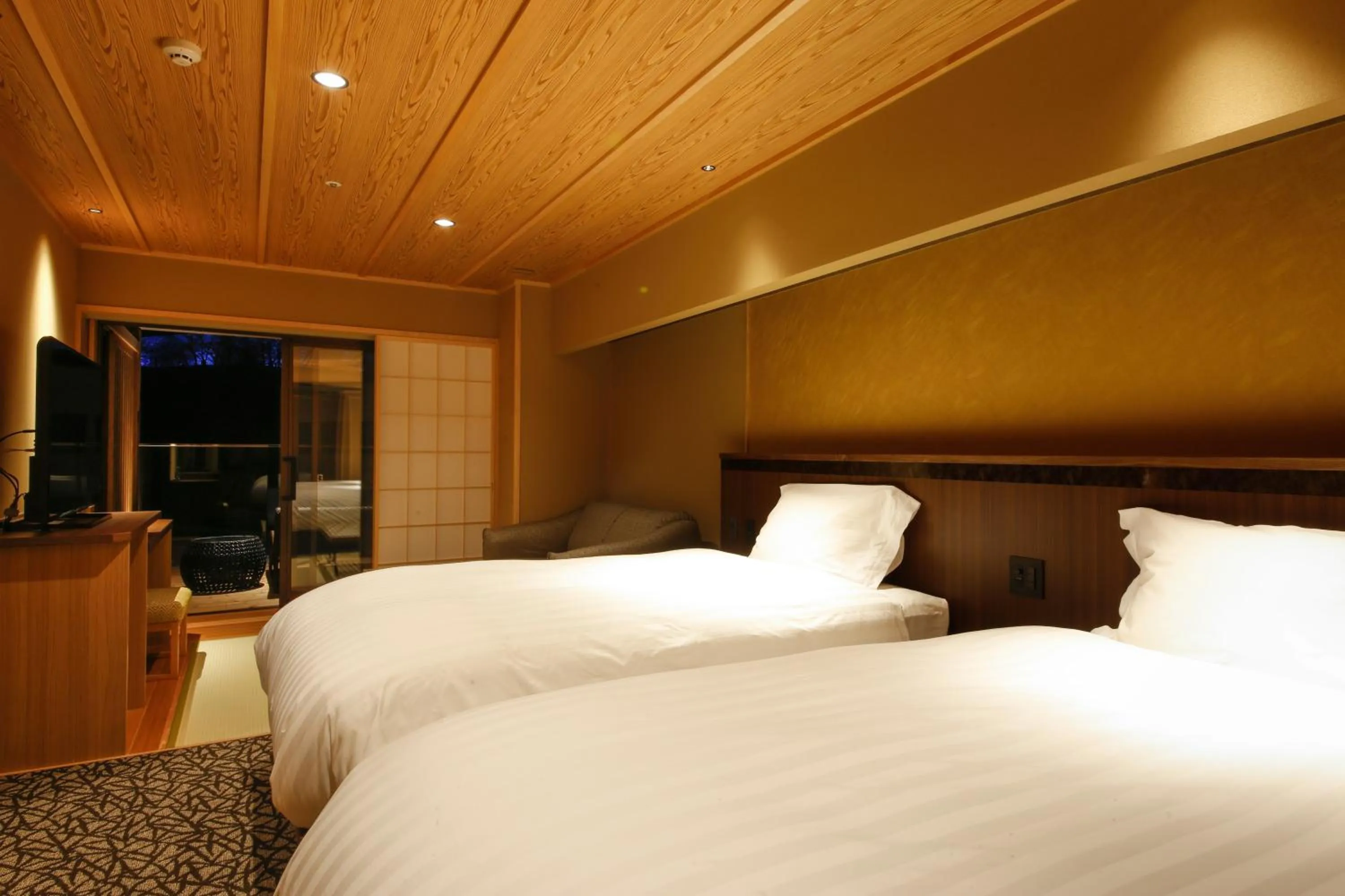 Bed in The Shiroyama Terrace Tsuyama Villa