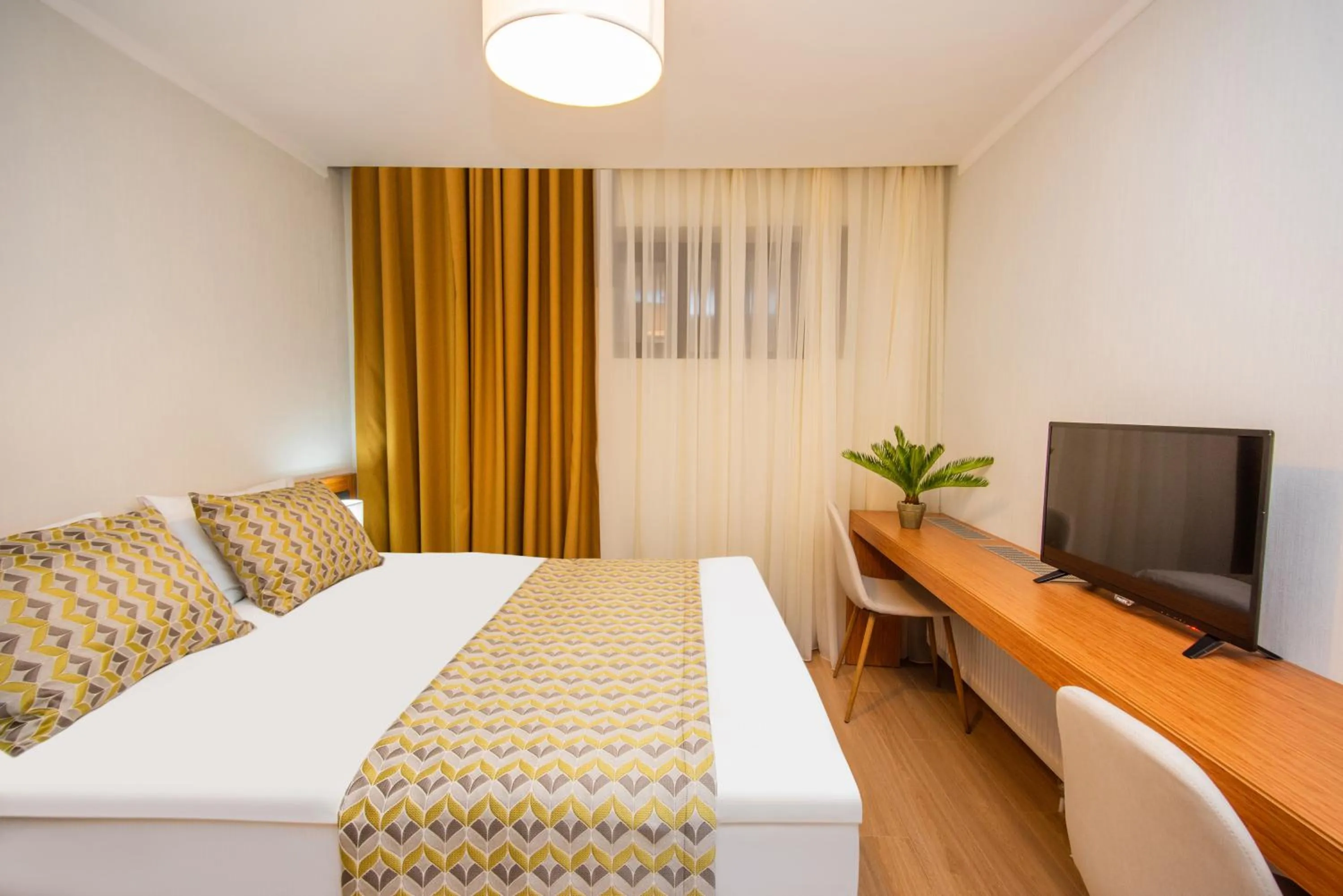 Bed in Orbi Palace Hotel Official