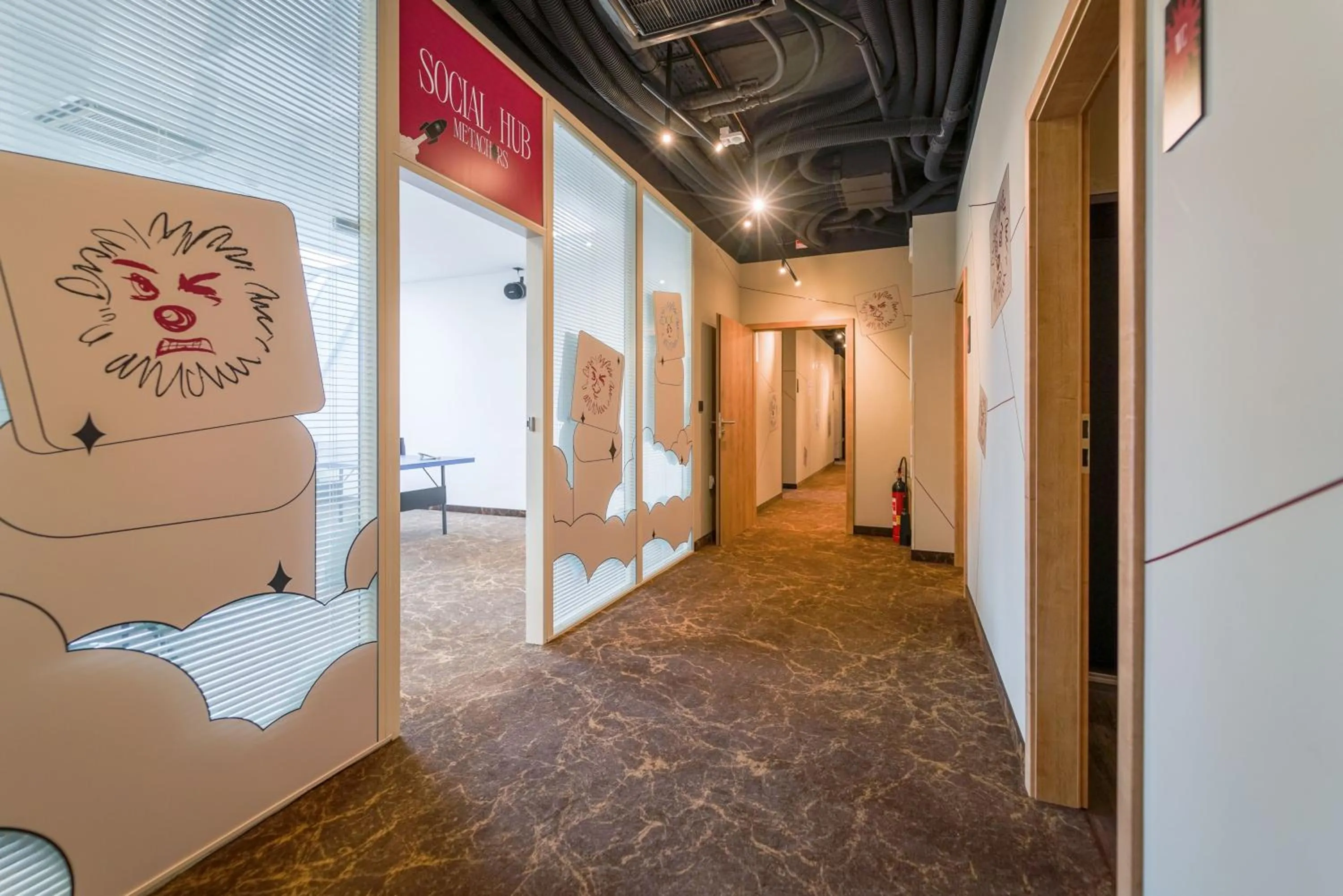 Communal lounge/ TV room in CHORS like a hotel - Capsule & NFT Boutique Hostel Bratislava - City Center