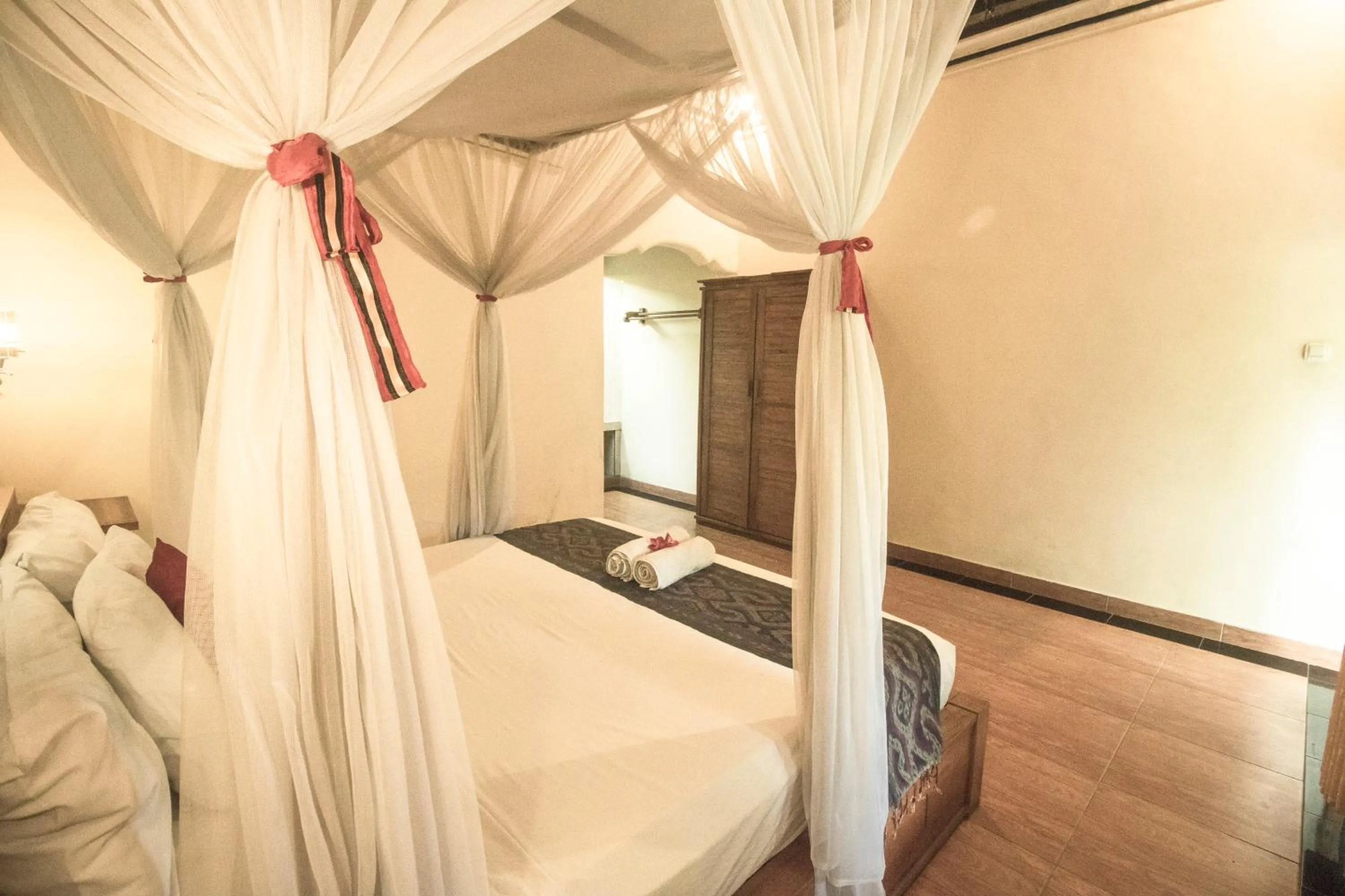 Bed in Trijaya Guest House Pemuteran