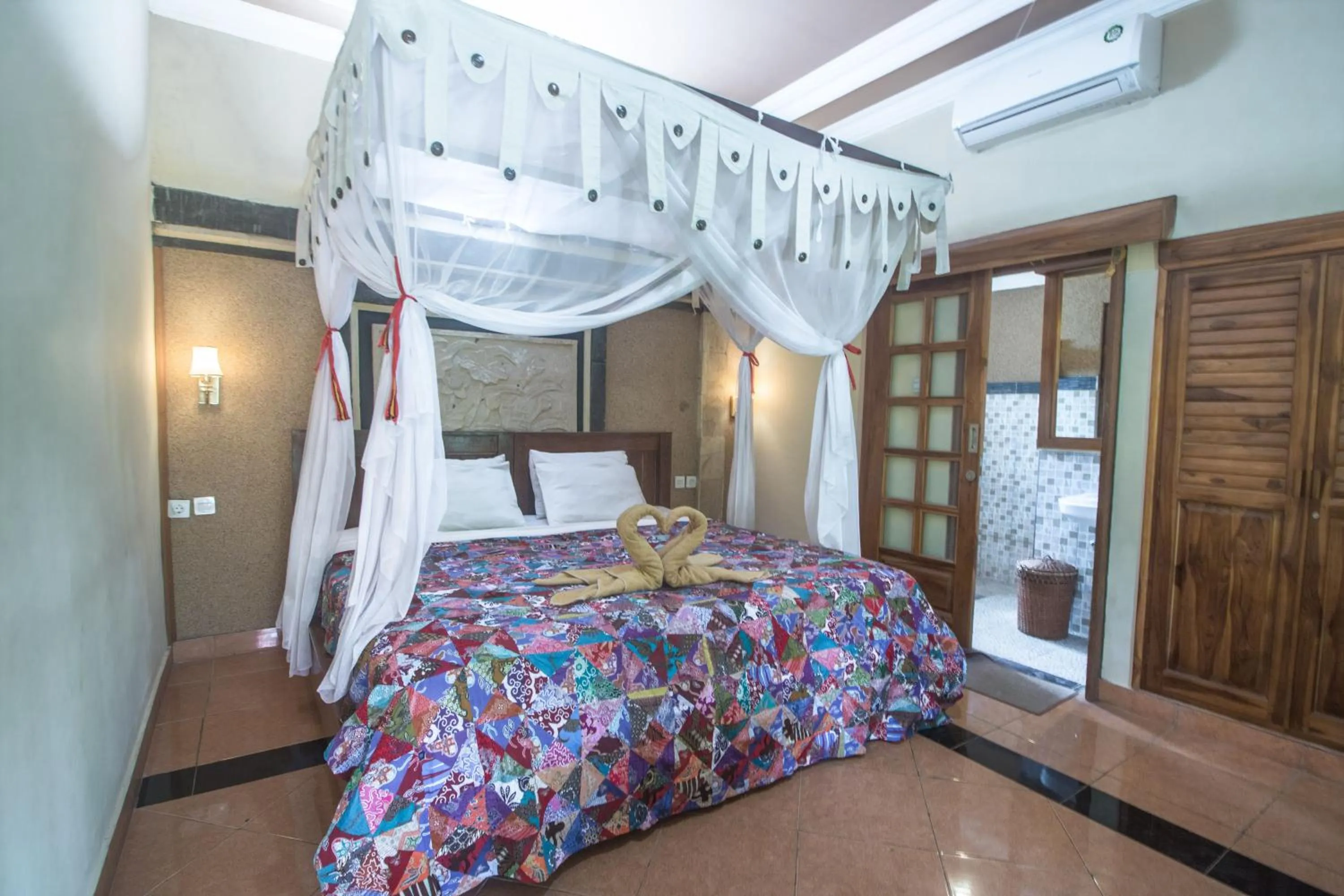 Bed in Trijaya Guest House Pemuteran