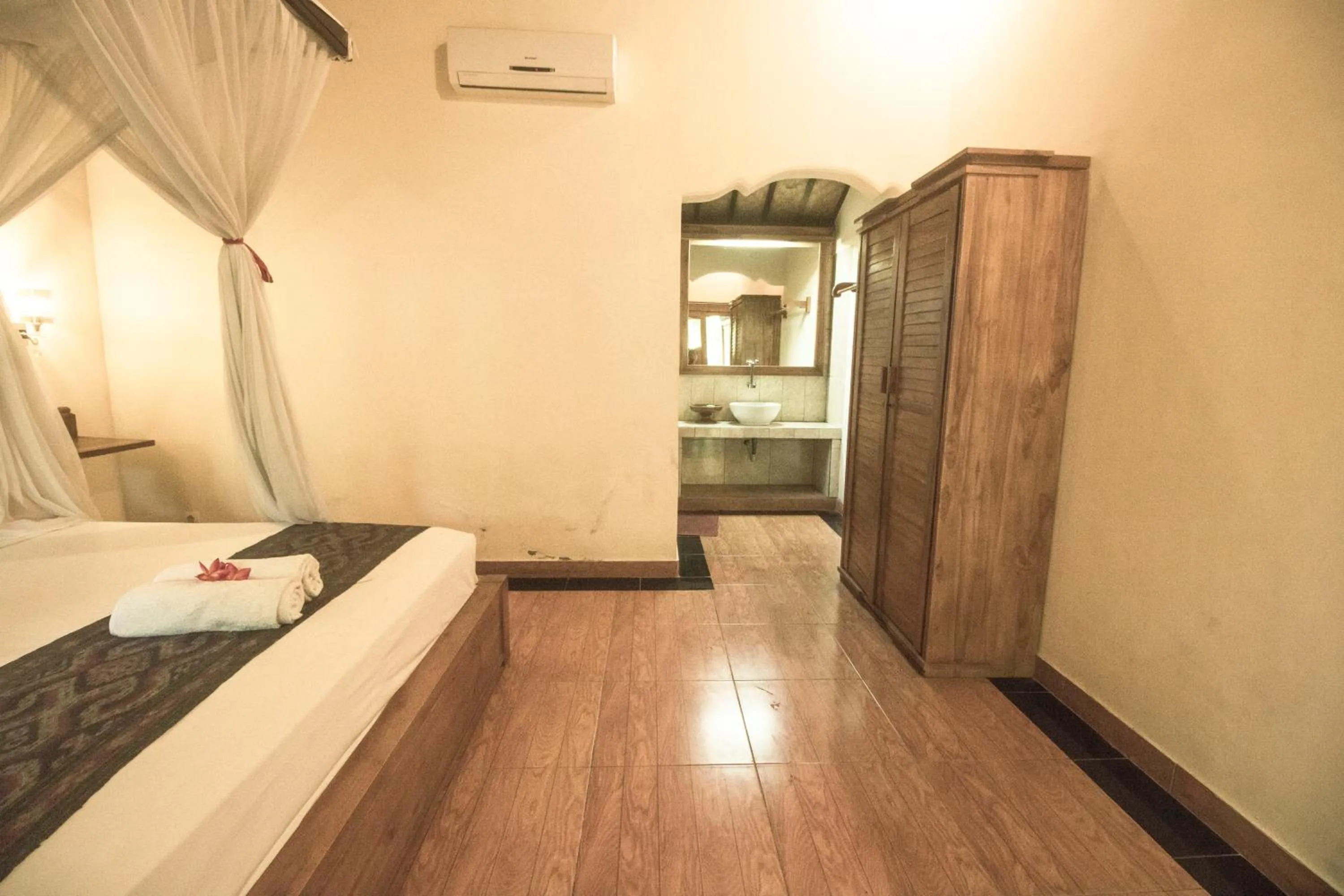 Bed in Trijaya Guest House Pemuteran