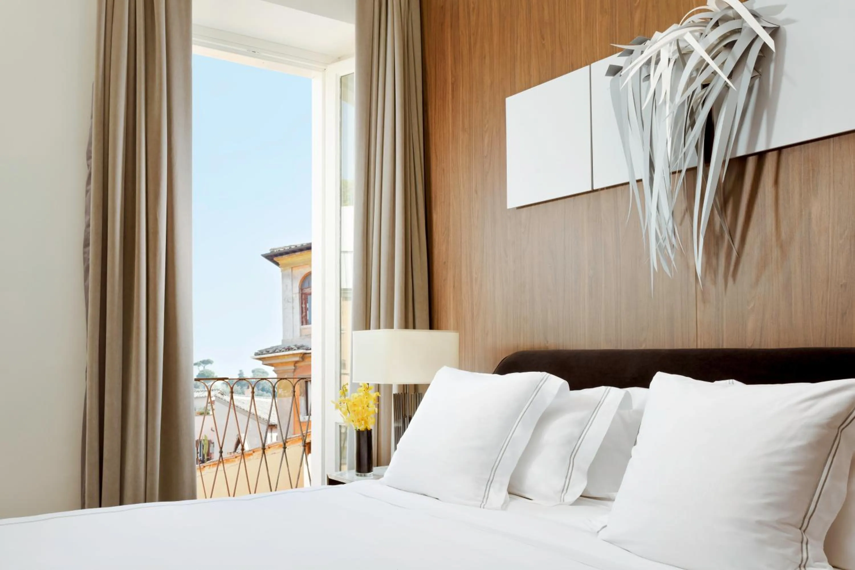 Bed in The First Dolce - Preferred Hotels & Resorts