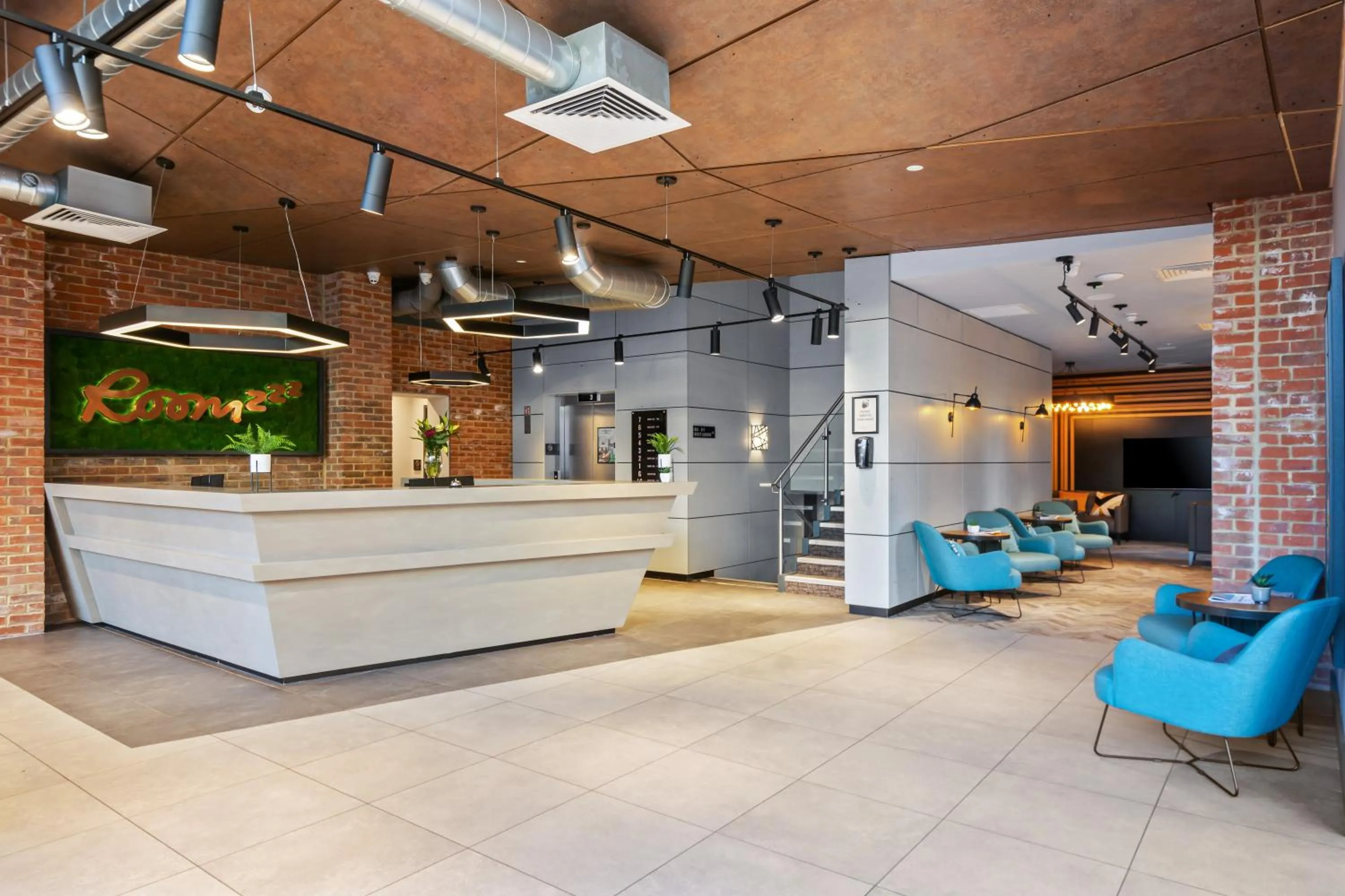 Lobby or reception in Roomzzz Newcastle City