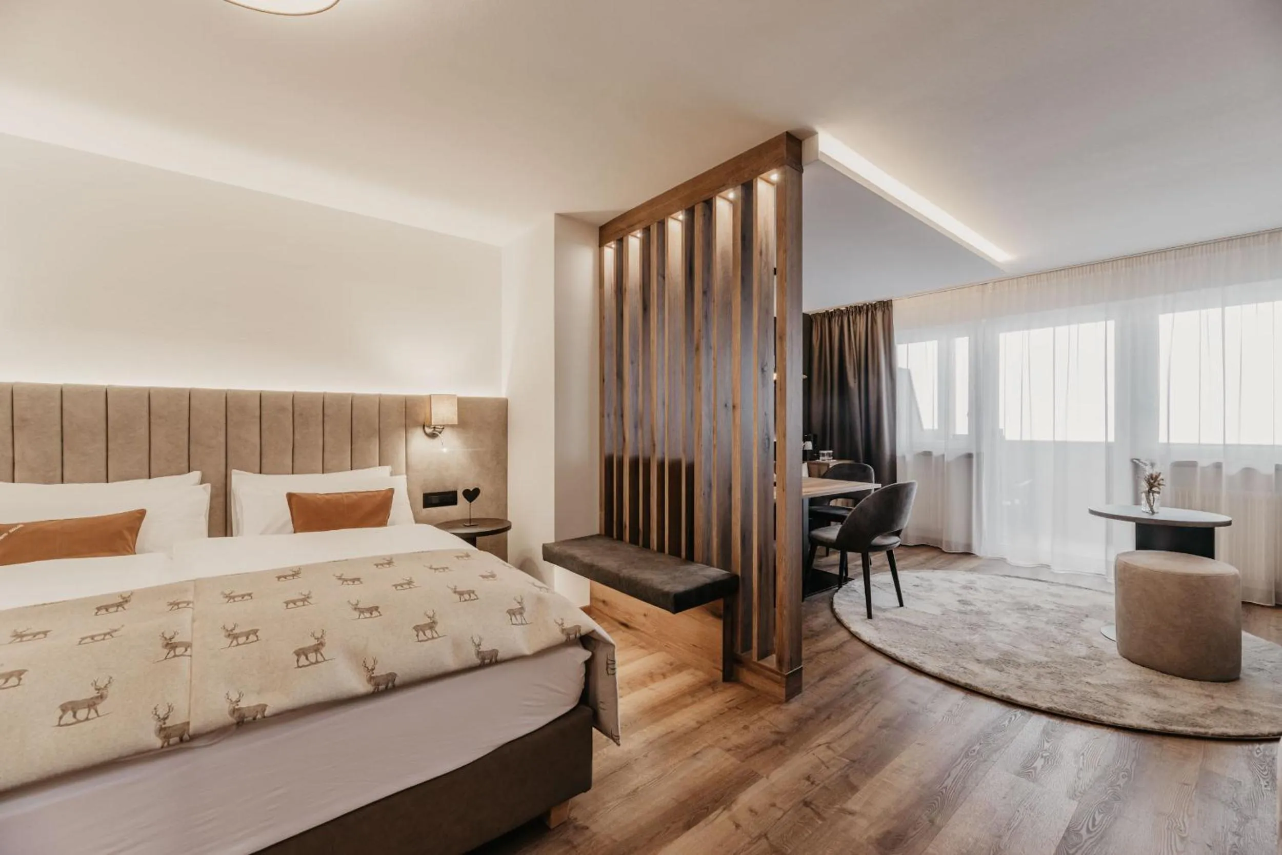 Seating area, Bed in Freina Mountain Lifestyle Hotel