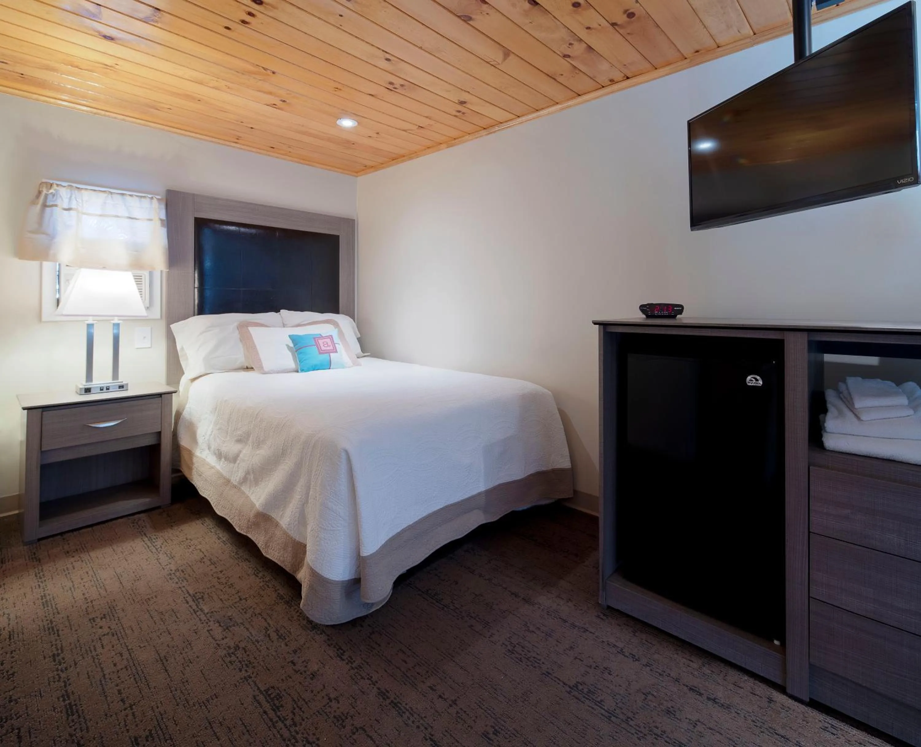 Bed in Alouette Beach Resort Economy Rooms